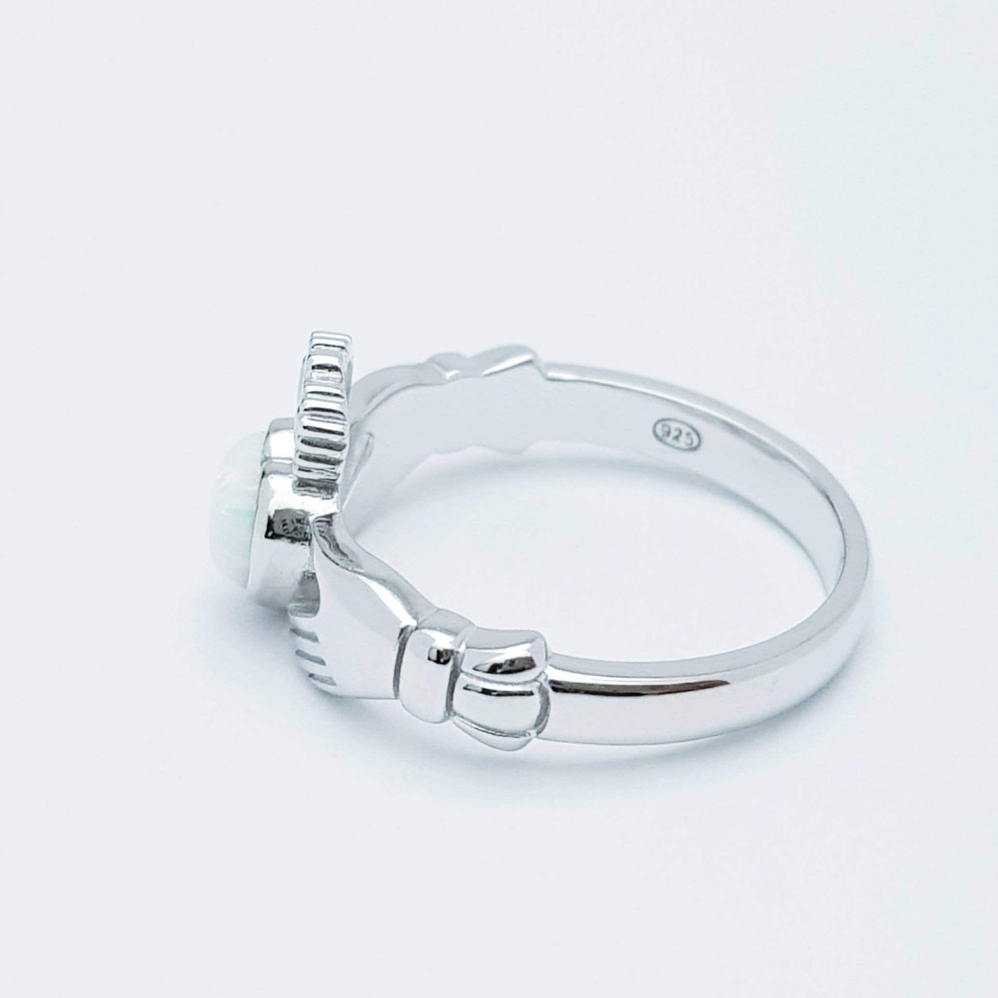 Sterling Silver Claddagh ring set with white opal heart, October birthstone