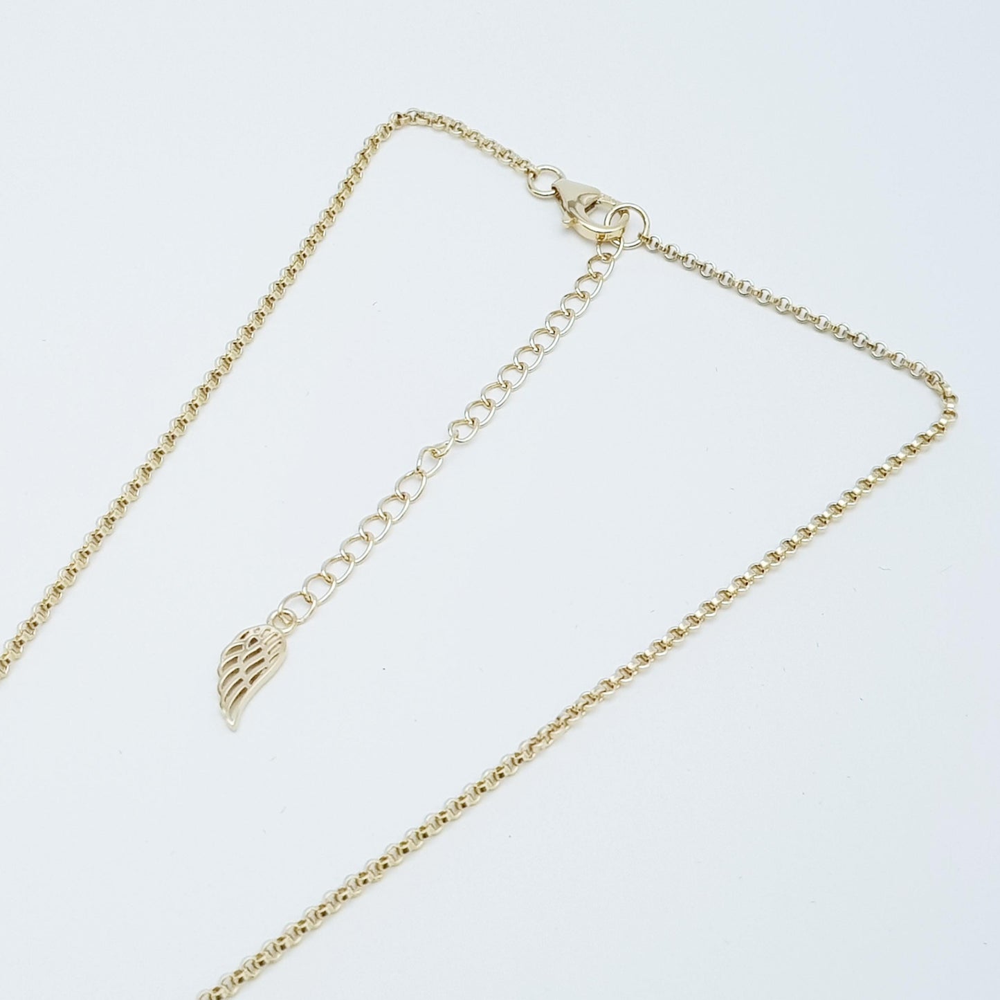 Dainty Sterling Silver claddagh necklace set with blue September birthstone