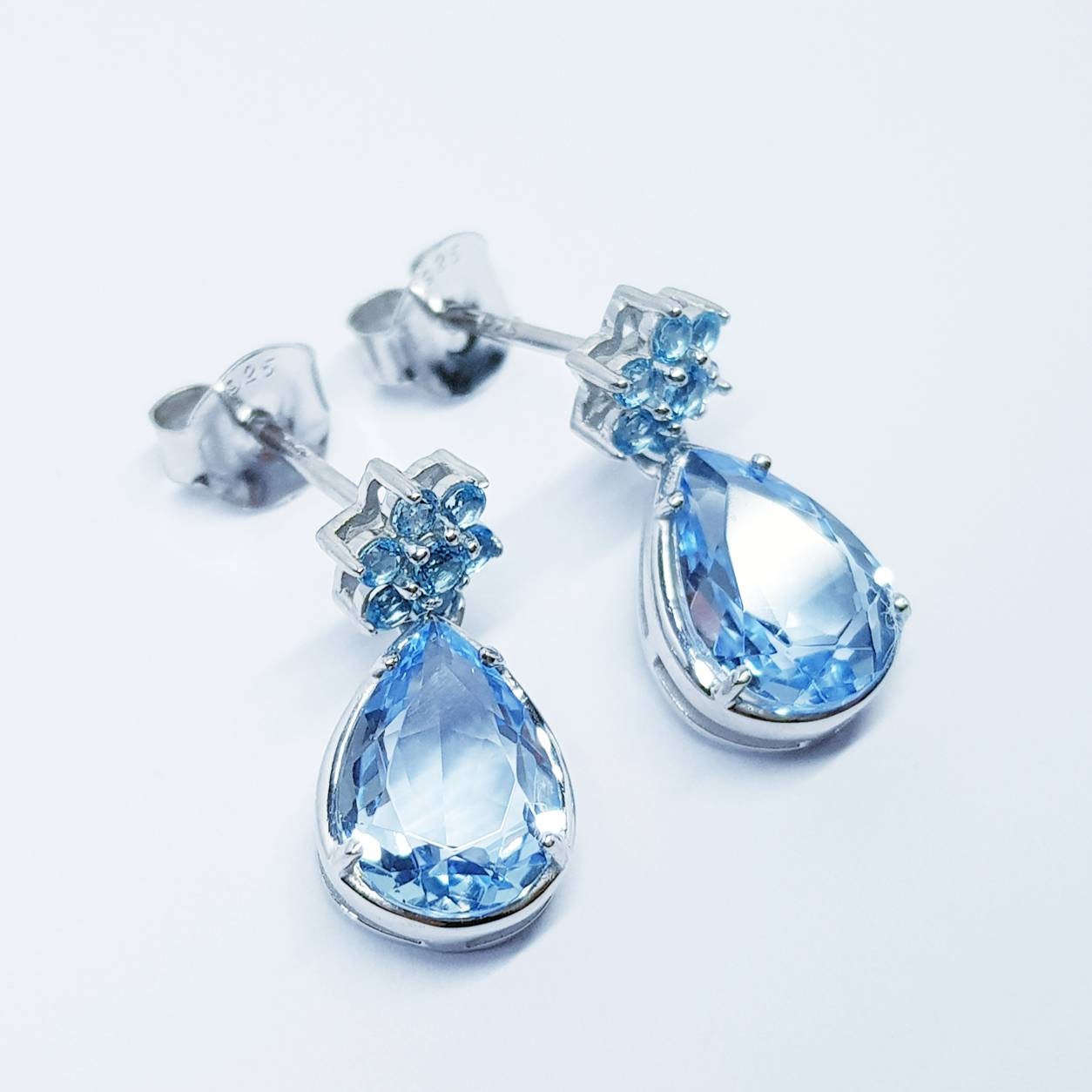 Light blue aquamarine drop earrings, teardrop shape blue studs, march birthstone silver earrings