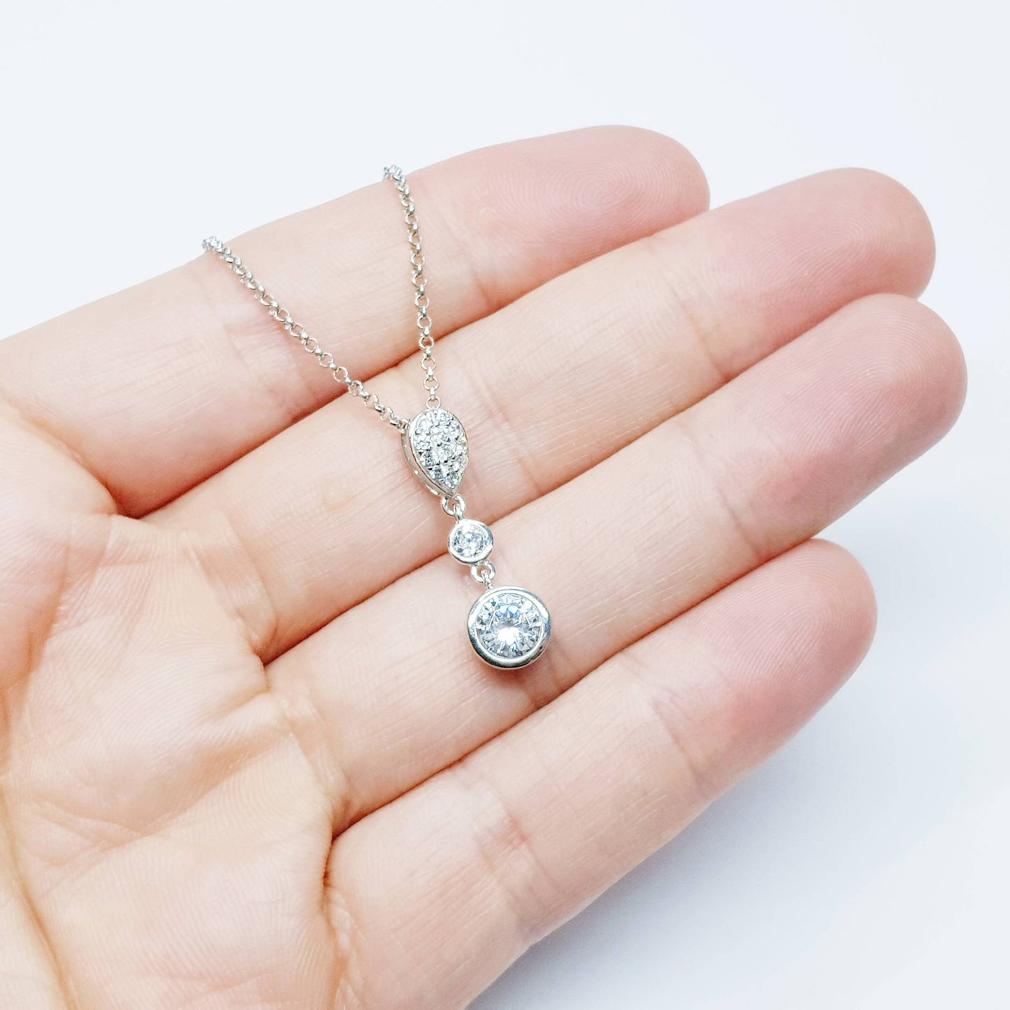 Elegant cubic zirconia pendant floating on sterling silver chain