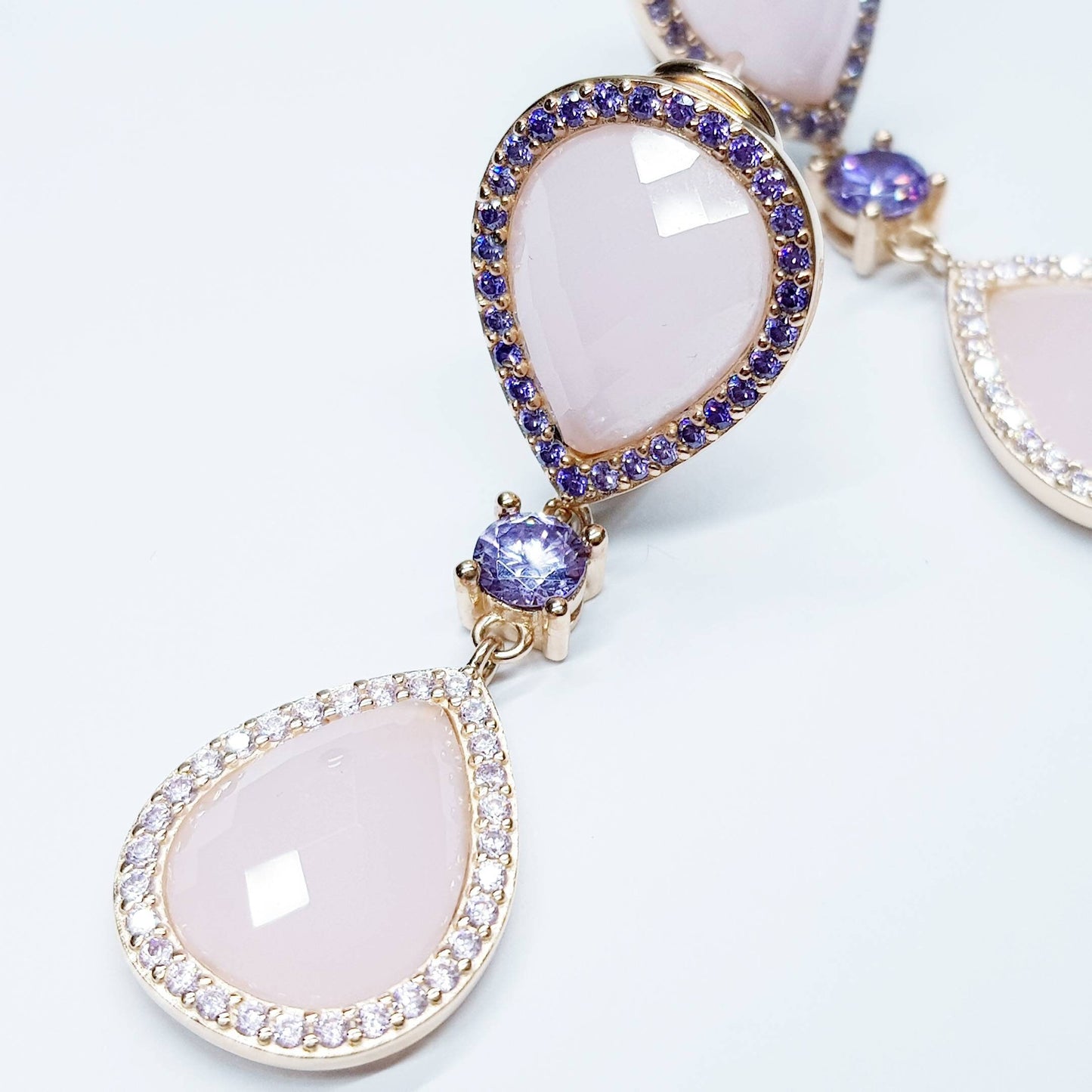 Light pink and lavender teardrop shaped earrings plated in rose gold