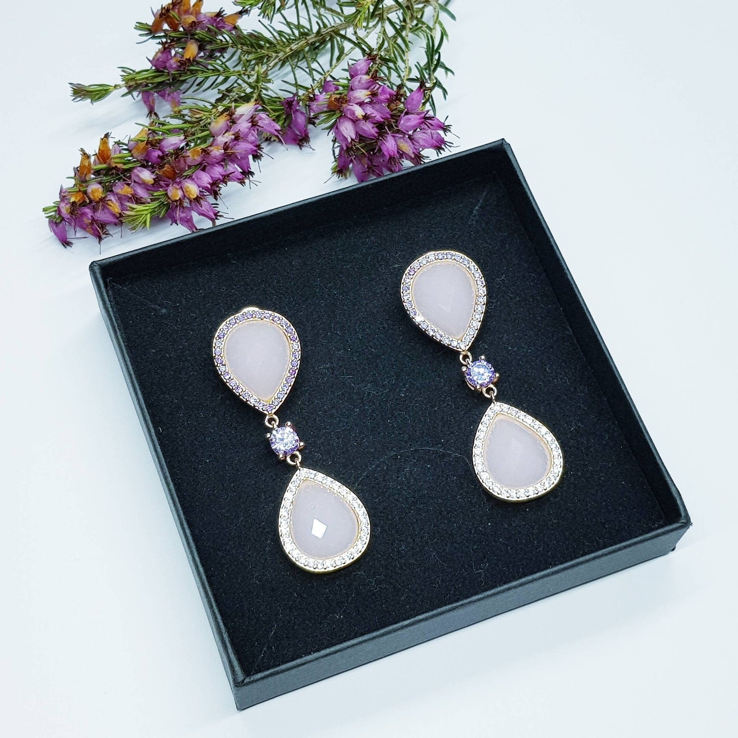 Light pink and lavender teardrop shaped earrings plated in rose gold