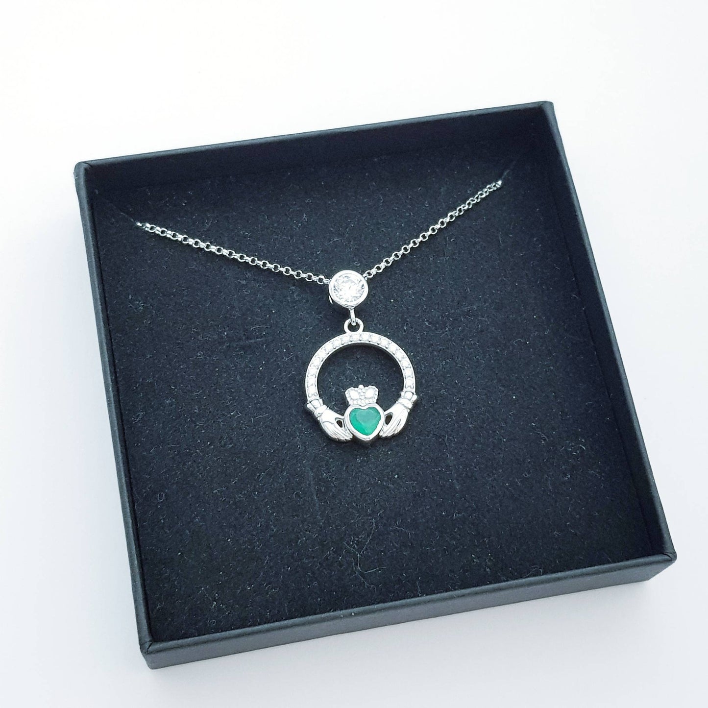 Sterling silver claddagh necklace with emerald green heart shaped stone