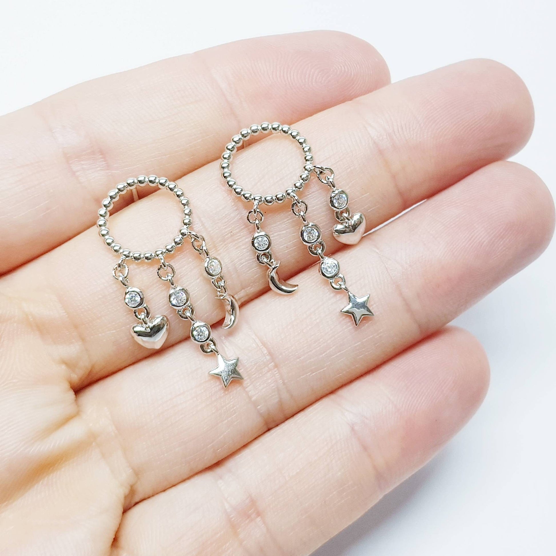 Sterling Silver drop earrings with moon, star and heart charm