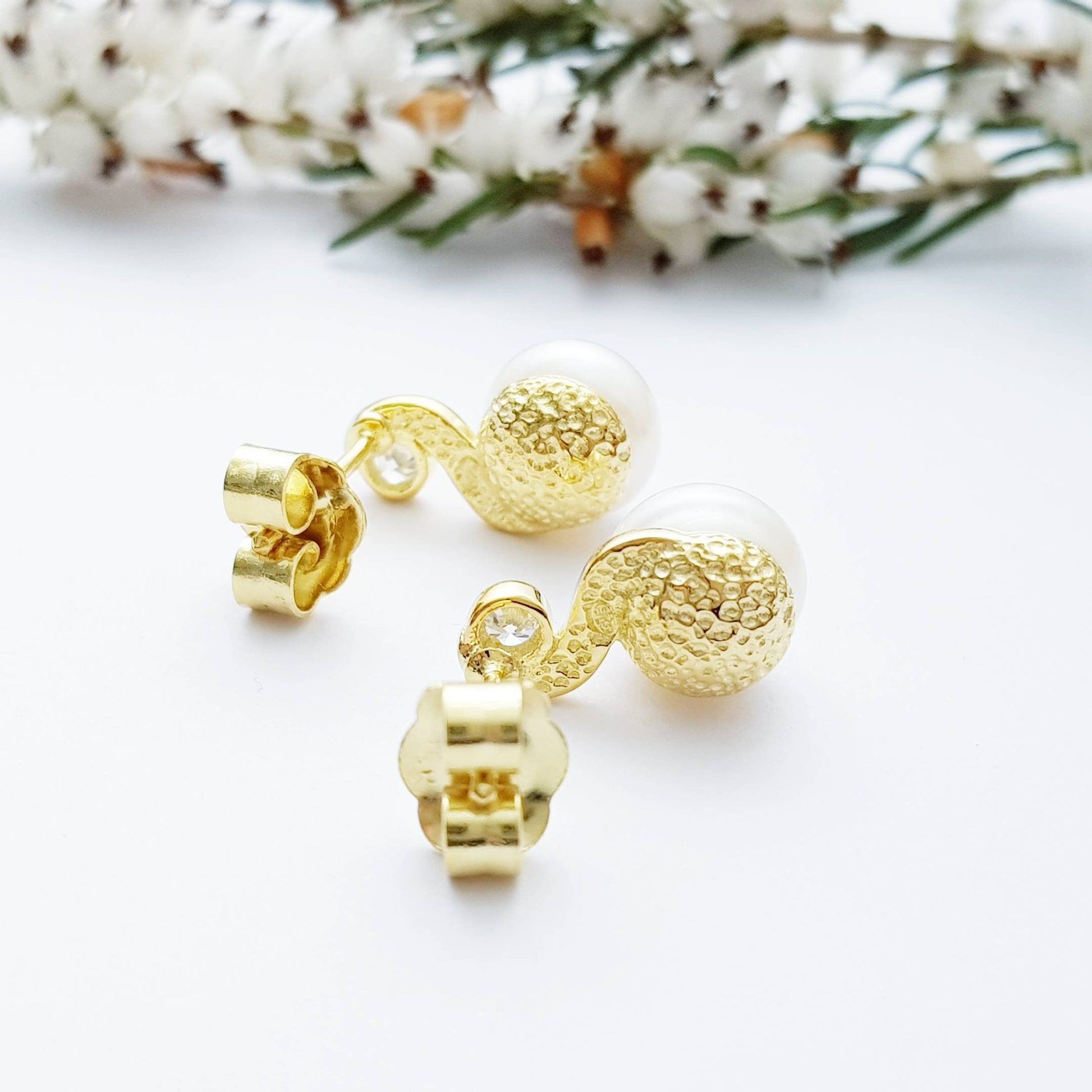 Gold plated sterling silver stud earrings with freshwater pearl