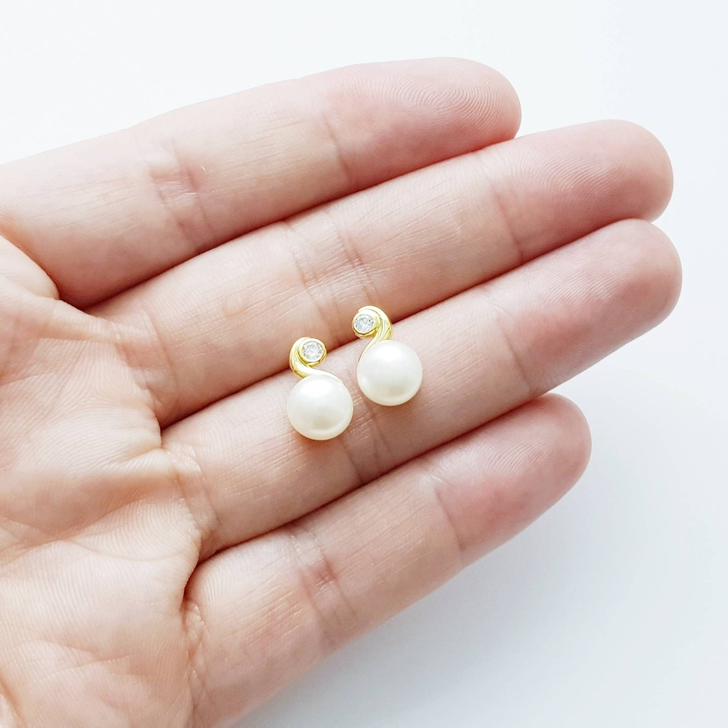 Gold plated sterling silver stud earrings with freshwater pearl