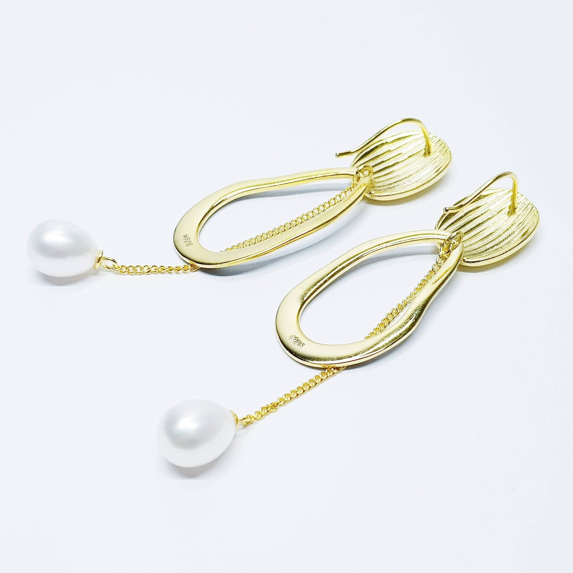 Modern floral inspired dress earrings with black lacquer and freshwater pearls