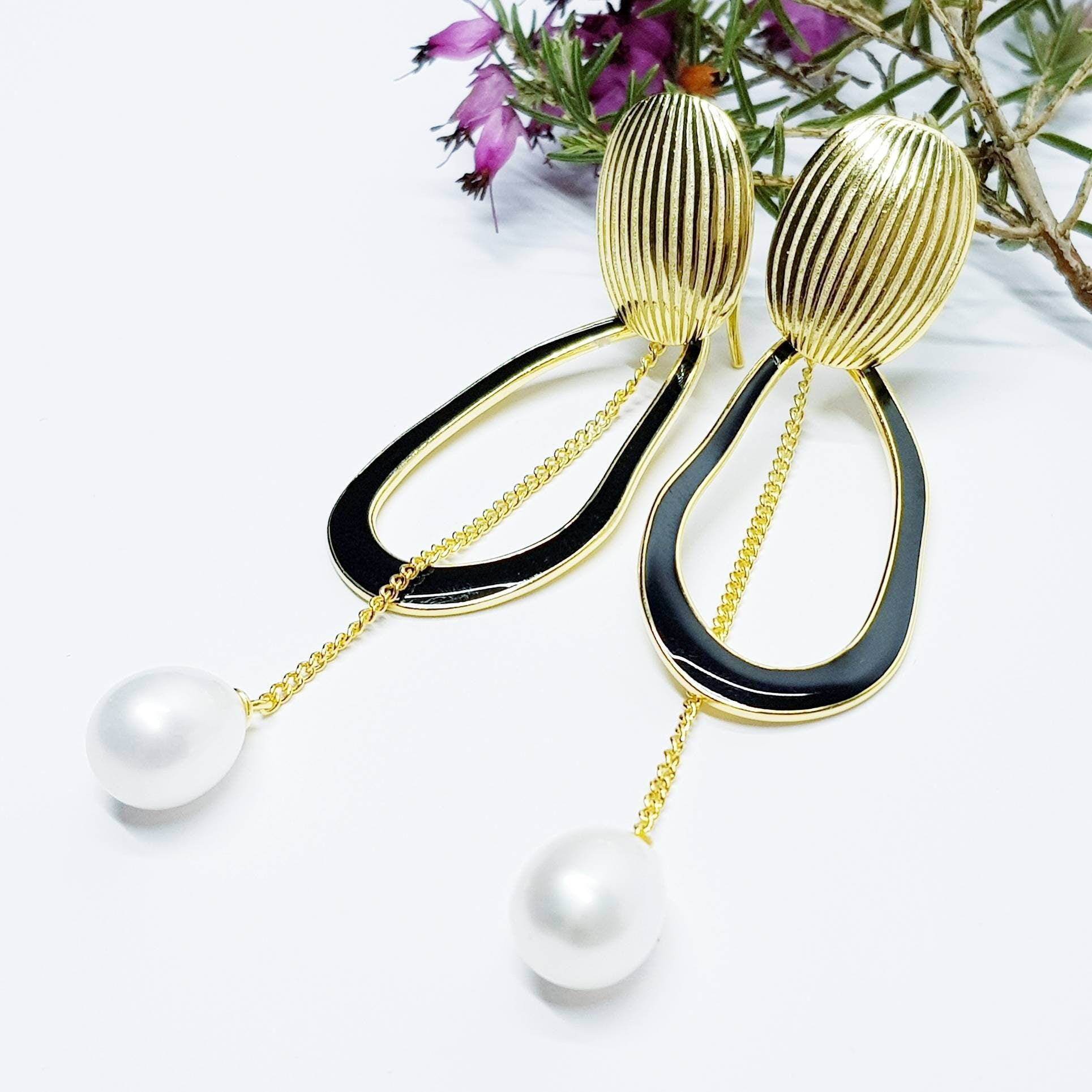 Modern floral inspired dress earrings with black lacquer and freshwater pearls