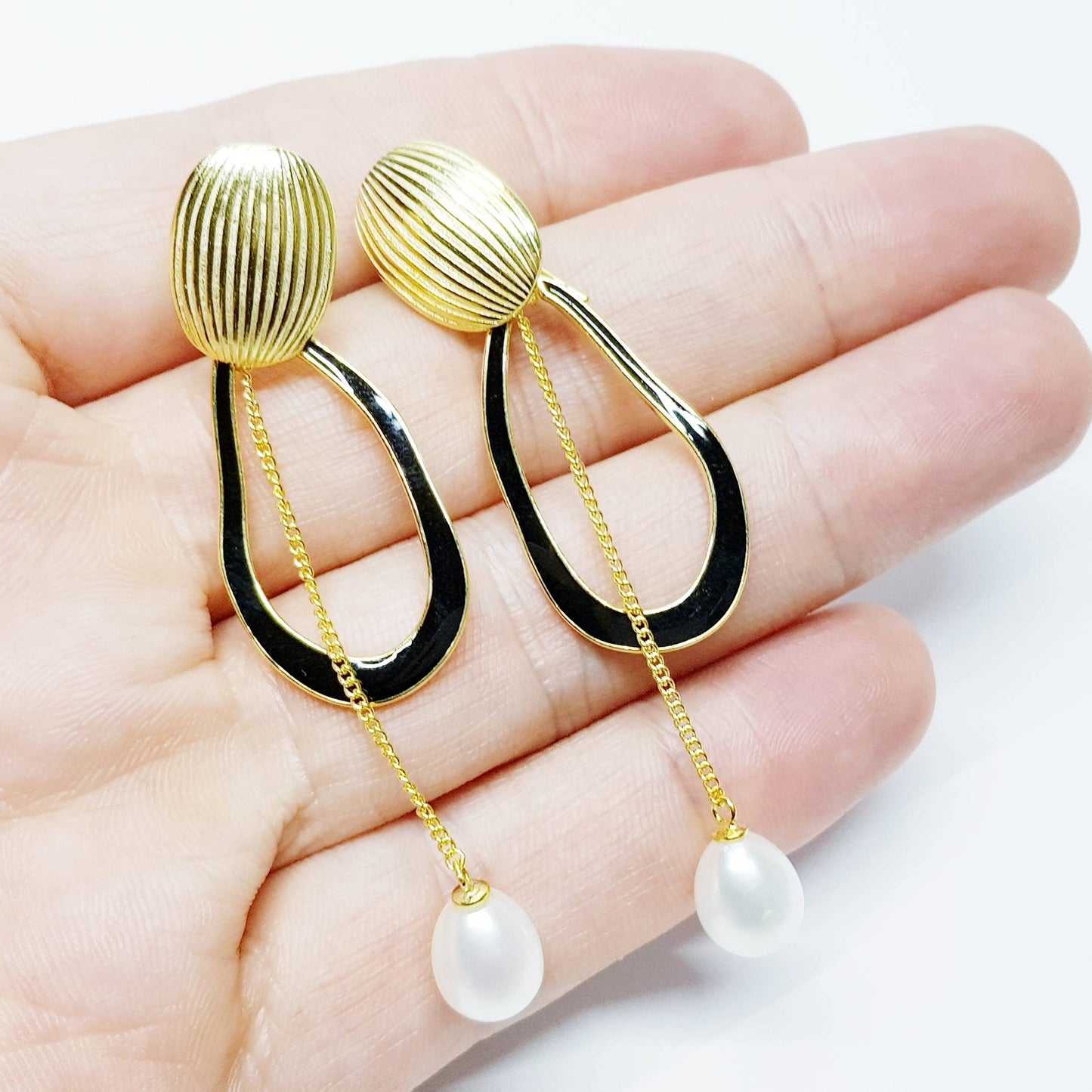 Modern floral inspired dress earrings with black lacquer and freshwater pearls