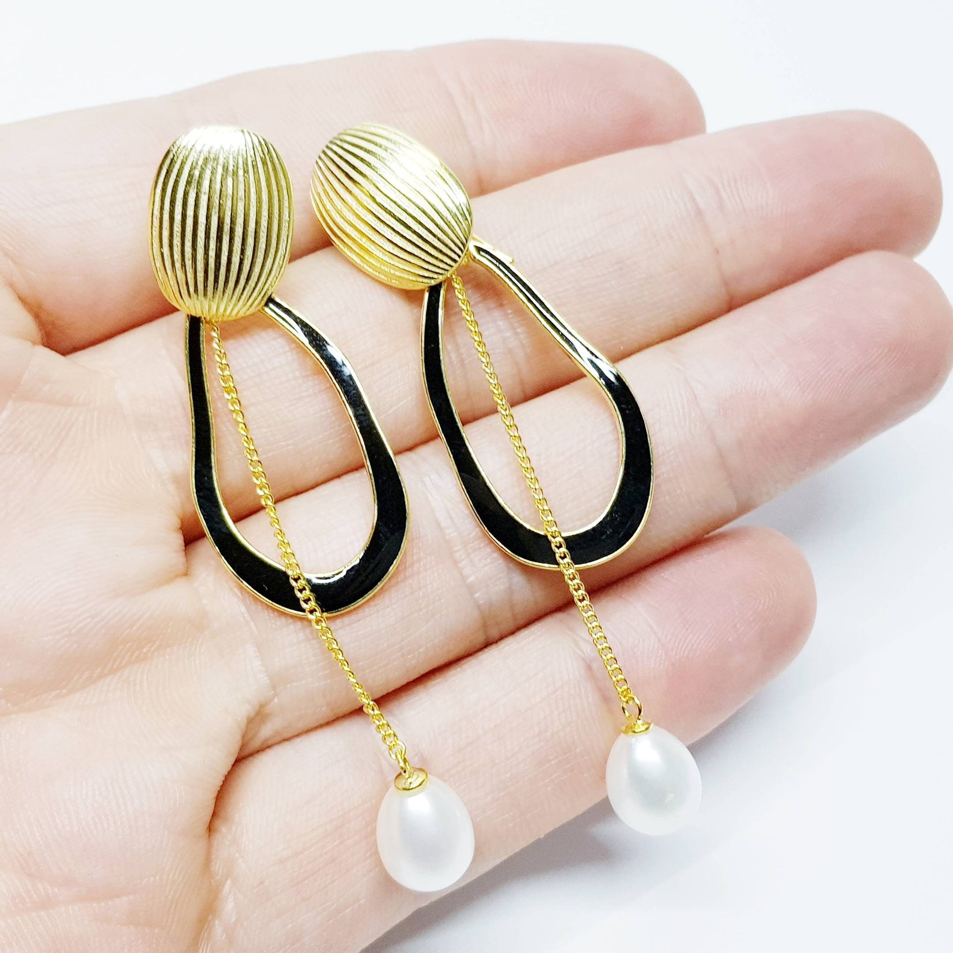 Modern floral inspired dress earrings with black lacquer and freshwater pearls