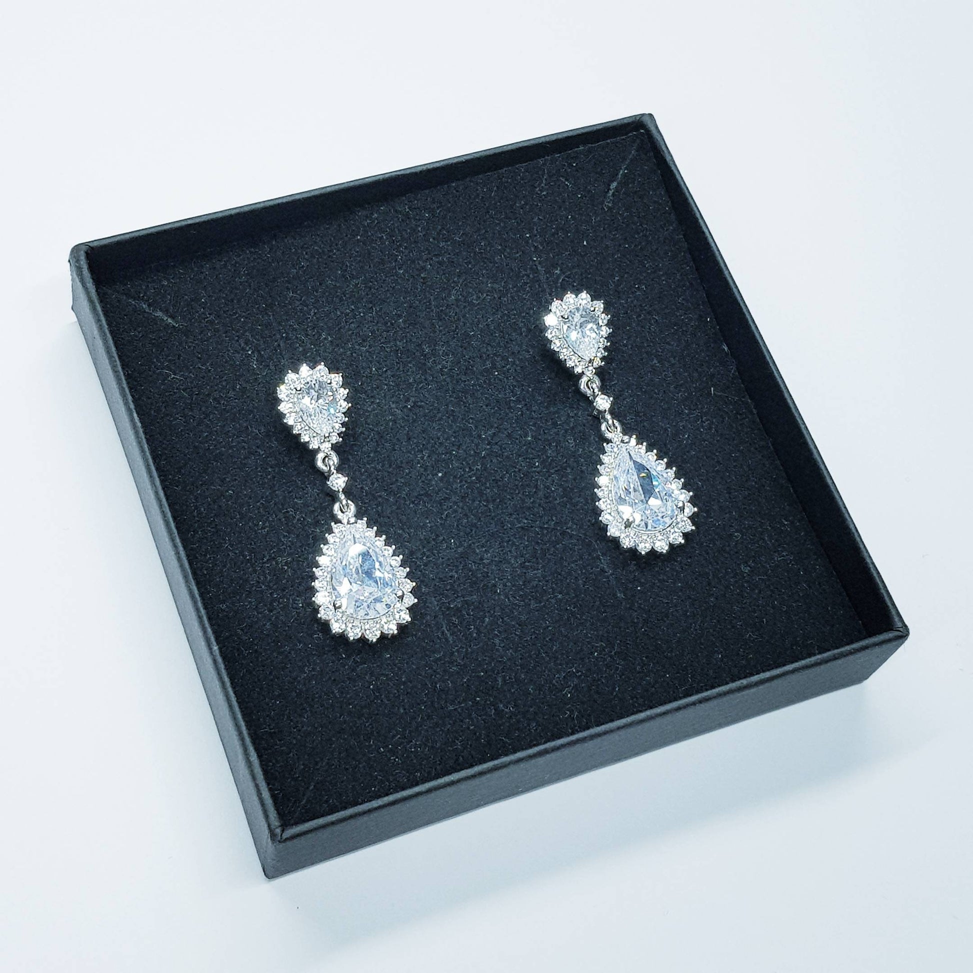 Long teardrop faux Diamond Earrings set in sterling silver