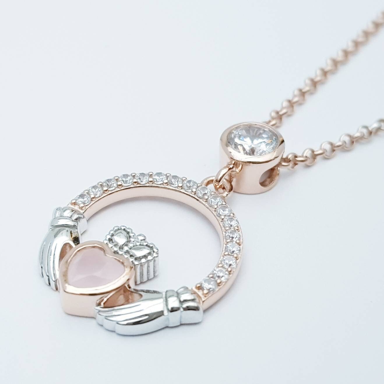 Baby pink Claddagh pendant, Irish claddagh necklace from Galway, Ireland, silver and rose gold claddagh pendant