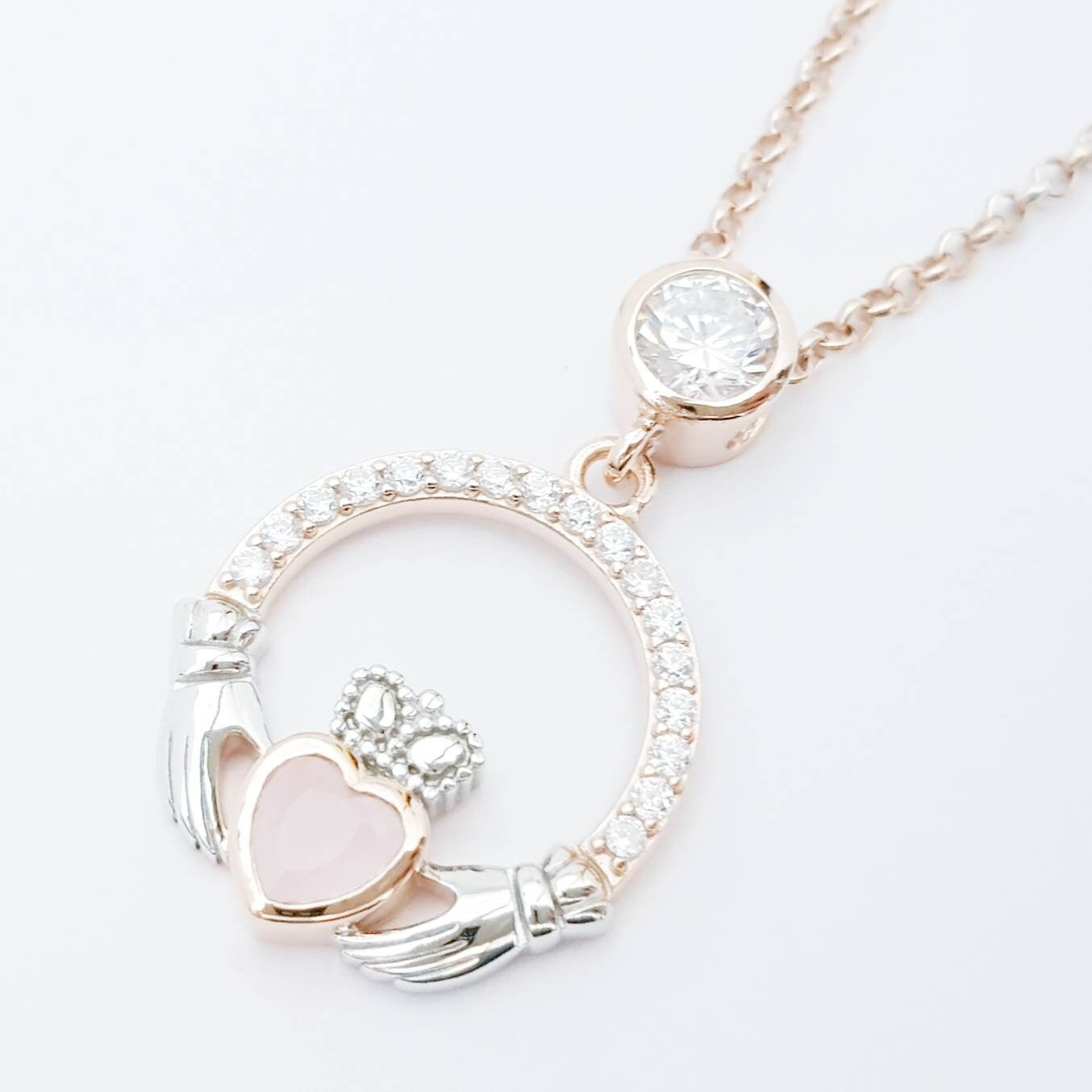 Baby pink Claddagh pendant, Irish claddagh necklace from Galway, Ireland, silver and rose gold claddagh pendant