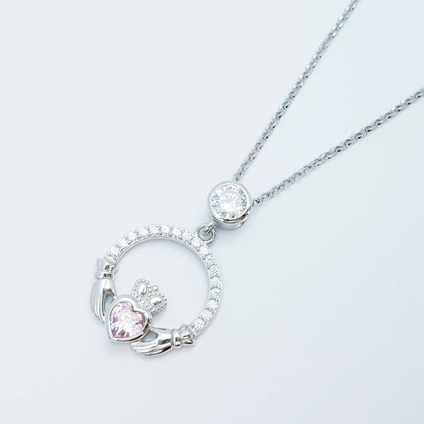 Pink Claddagh pendant, claddagh necklace, silver claddagh pendant with October birthstone