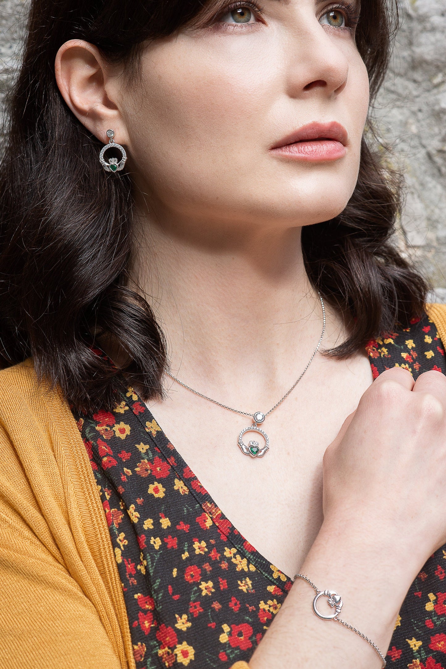 Sterling silver claddagh necklace with emerald green heart shaped stone