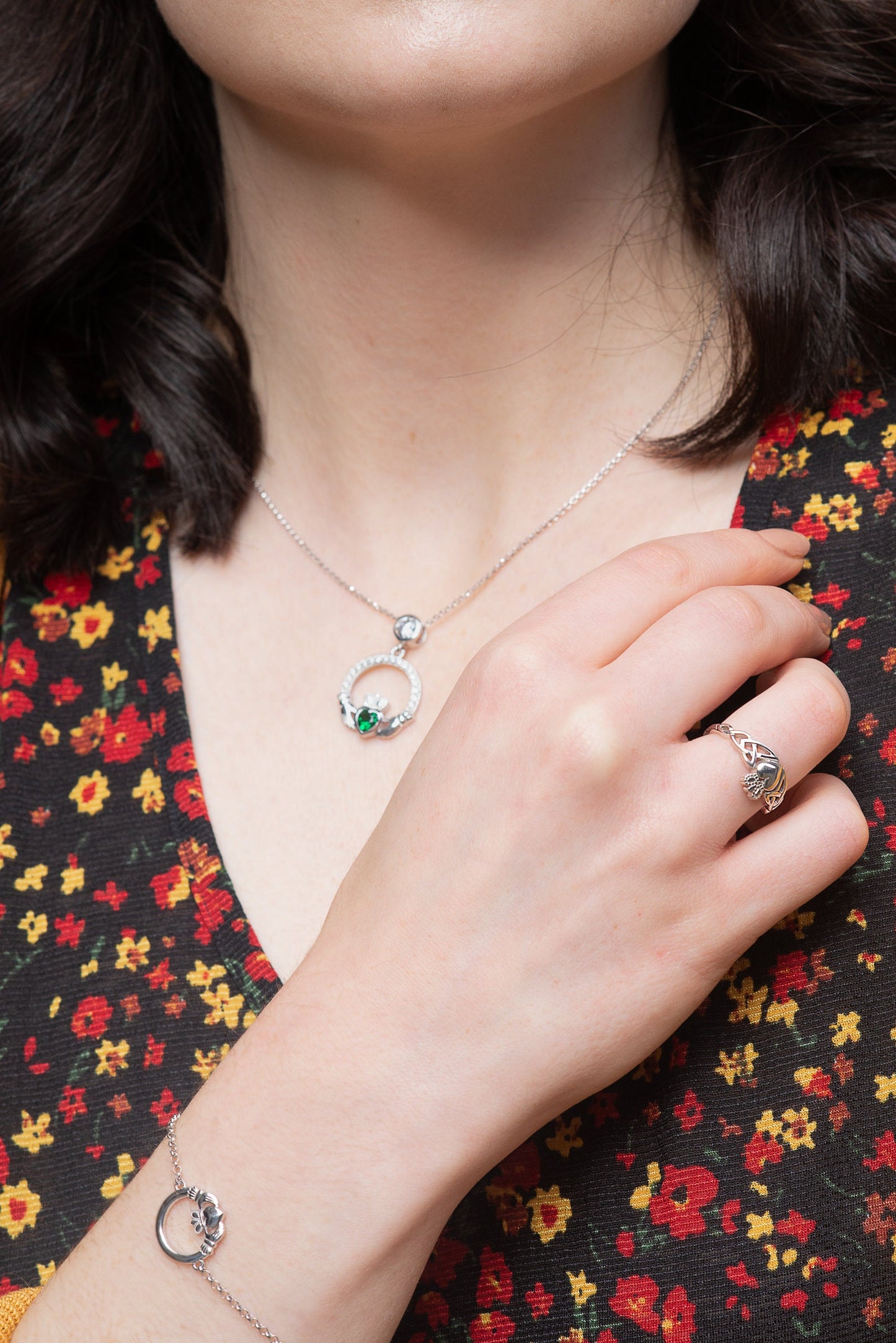 Sterling silver claddagh necklace with emerald green heart shaped stone
