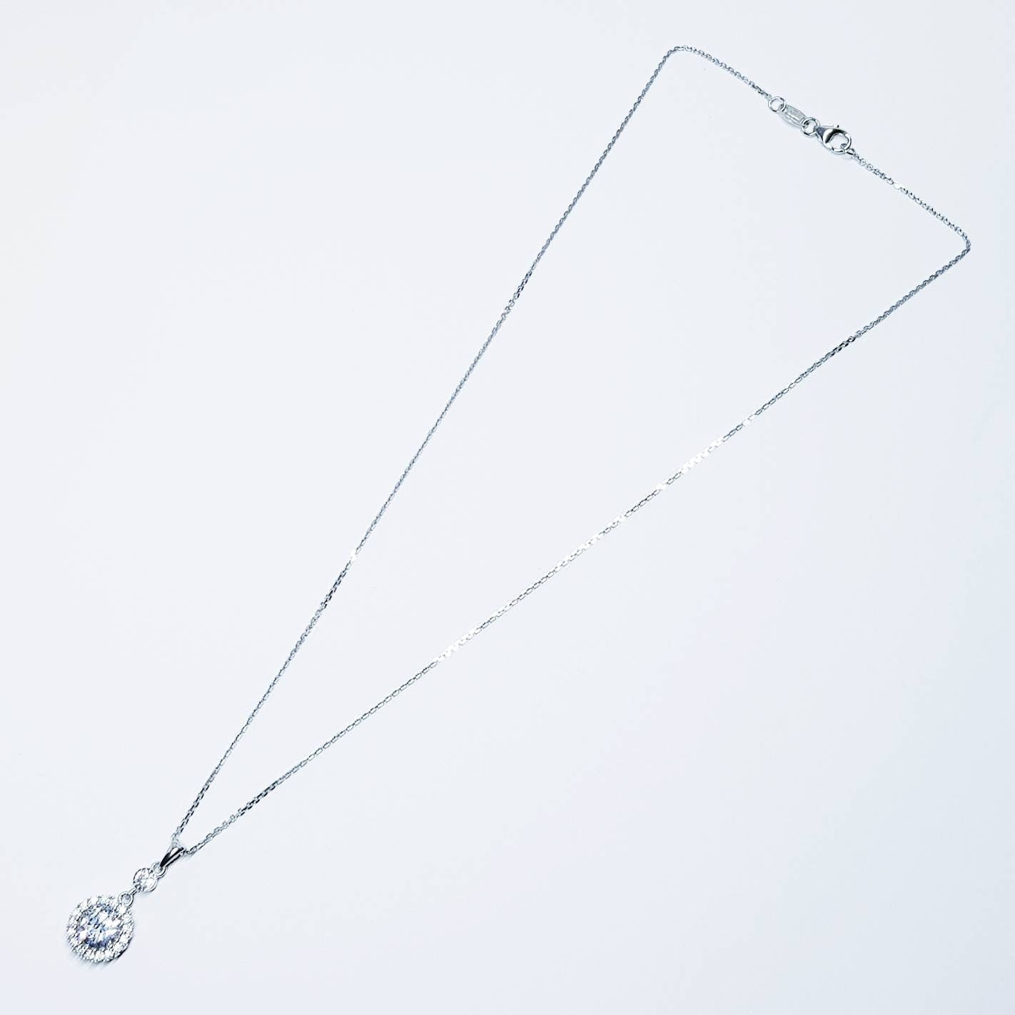 Vintage style round sterling silver necklace with sparkling white cubic zirconia