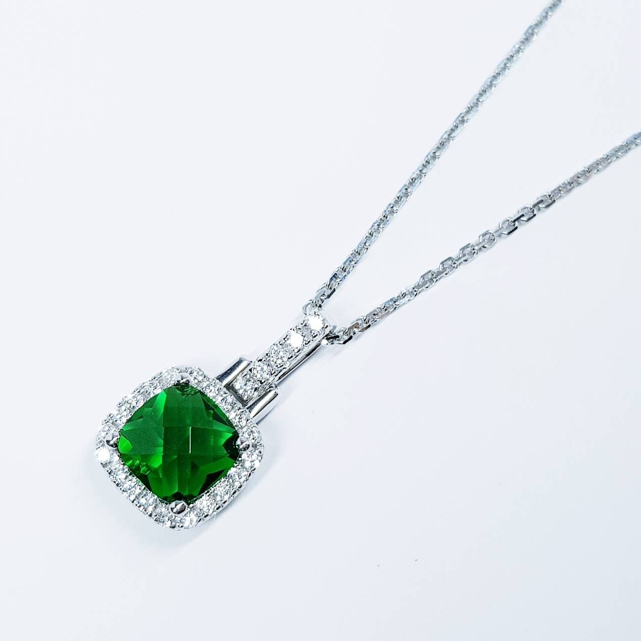 Sterling silver emerald green square necklace with cubic zirconia halo, vintage emerald pendant