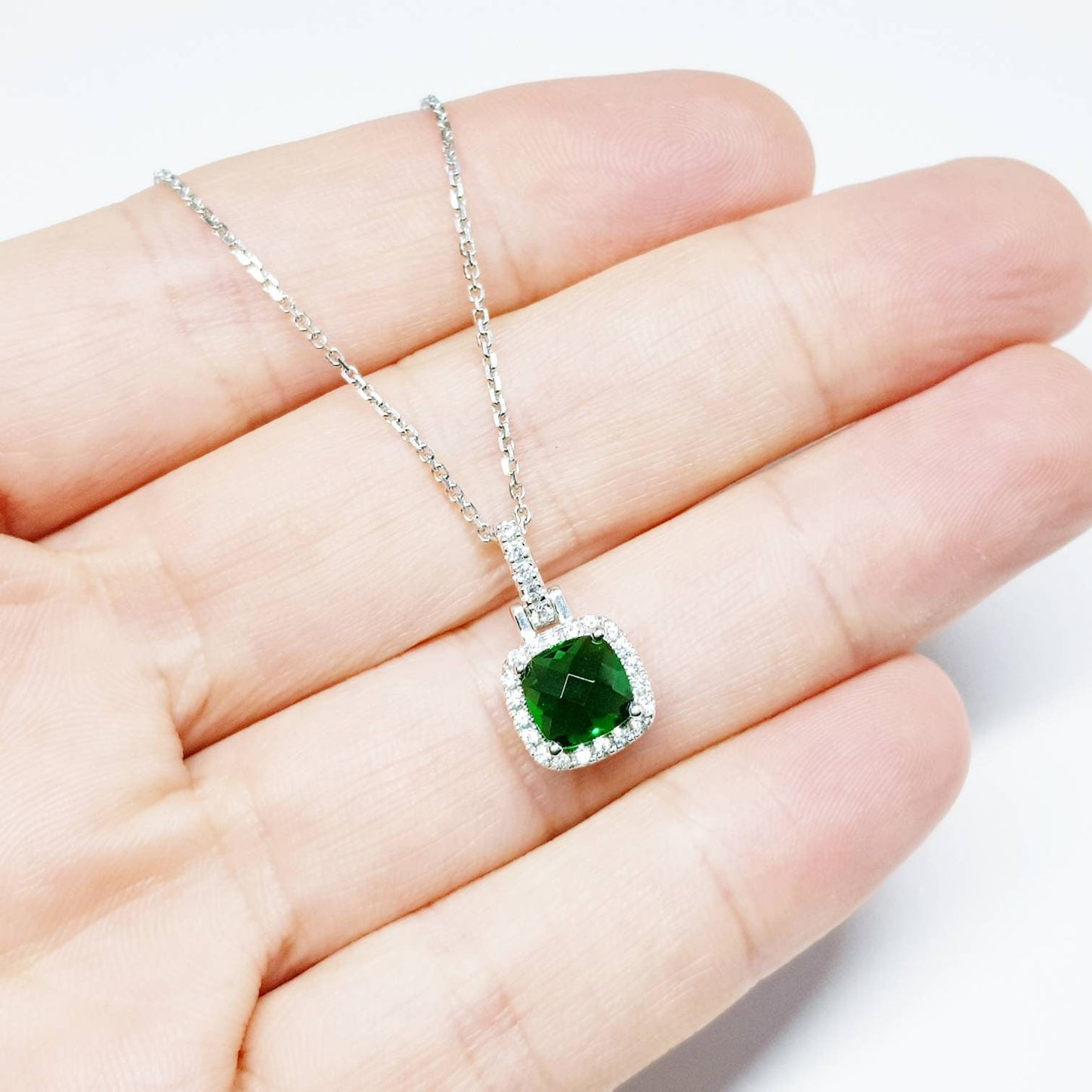 Sterling silver emerald green square necklace with cubic zirconia halo, vintage emerald pendant