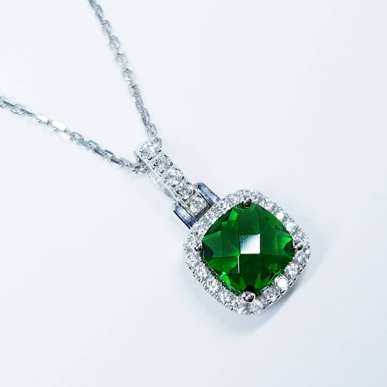 Sterling silver emerald green square necklace with cubic zirconia halo, vintage emerald pendant