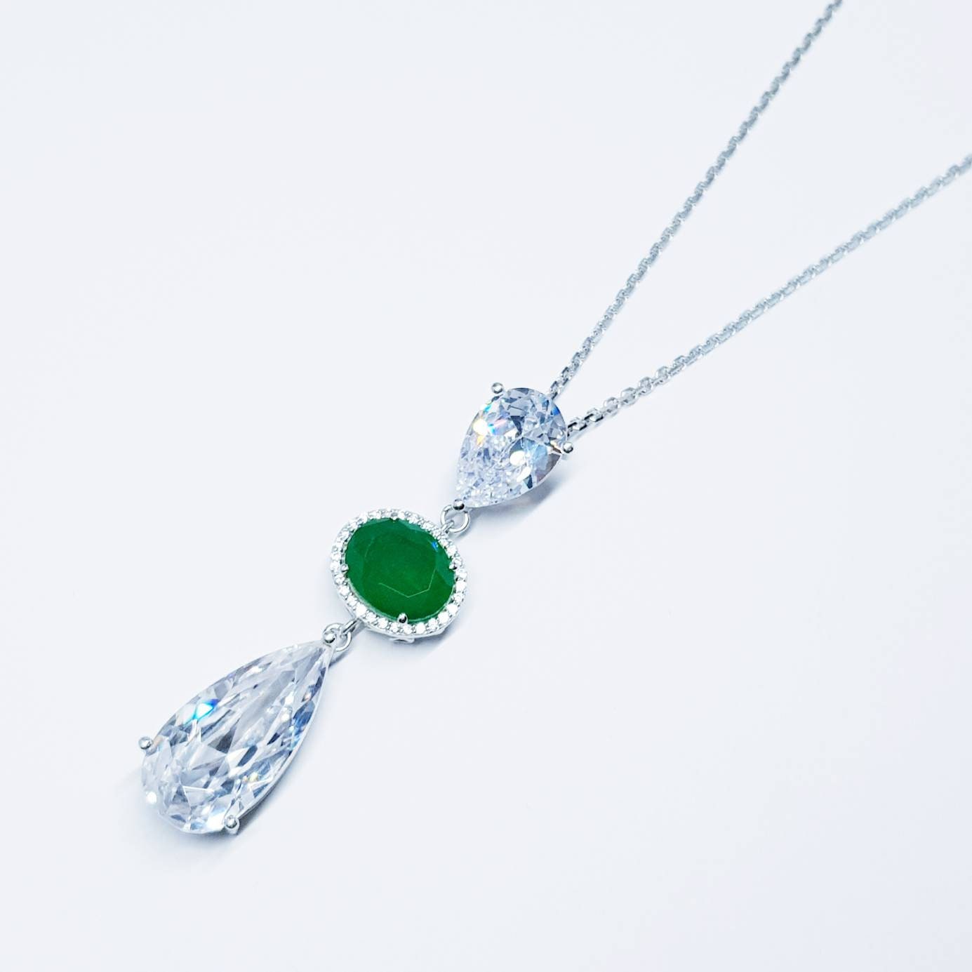 Exceptional large teardrop necklace with oval emerald green cubic zirconia