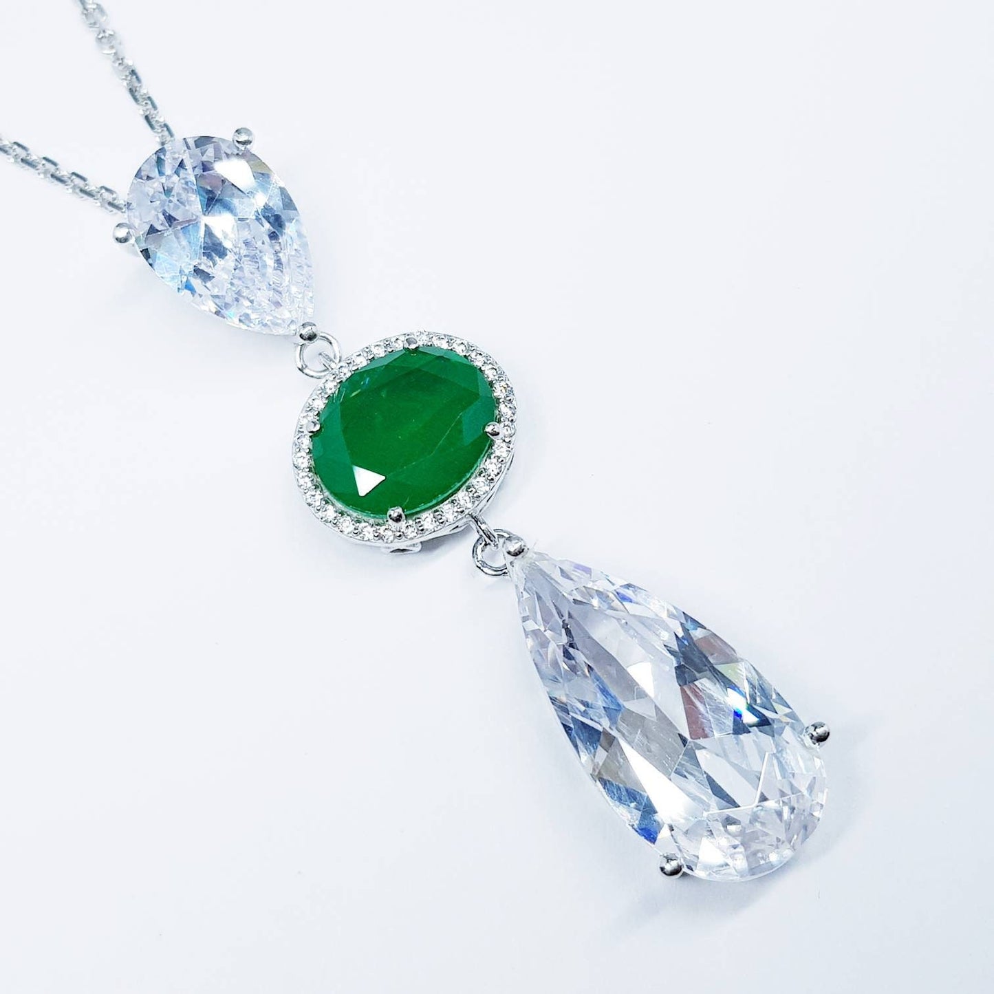 Exceptional large teardrop necklace with oval emerald green cubic zirconia