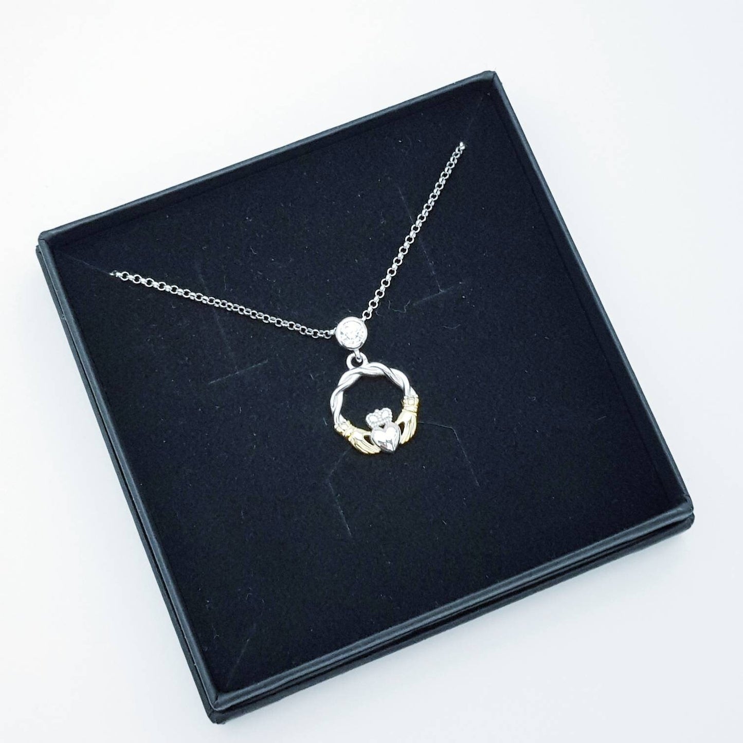 Cute Sterling Silver claddagh necklace with gold plating
