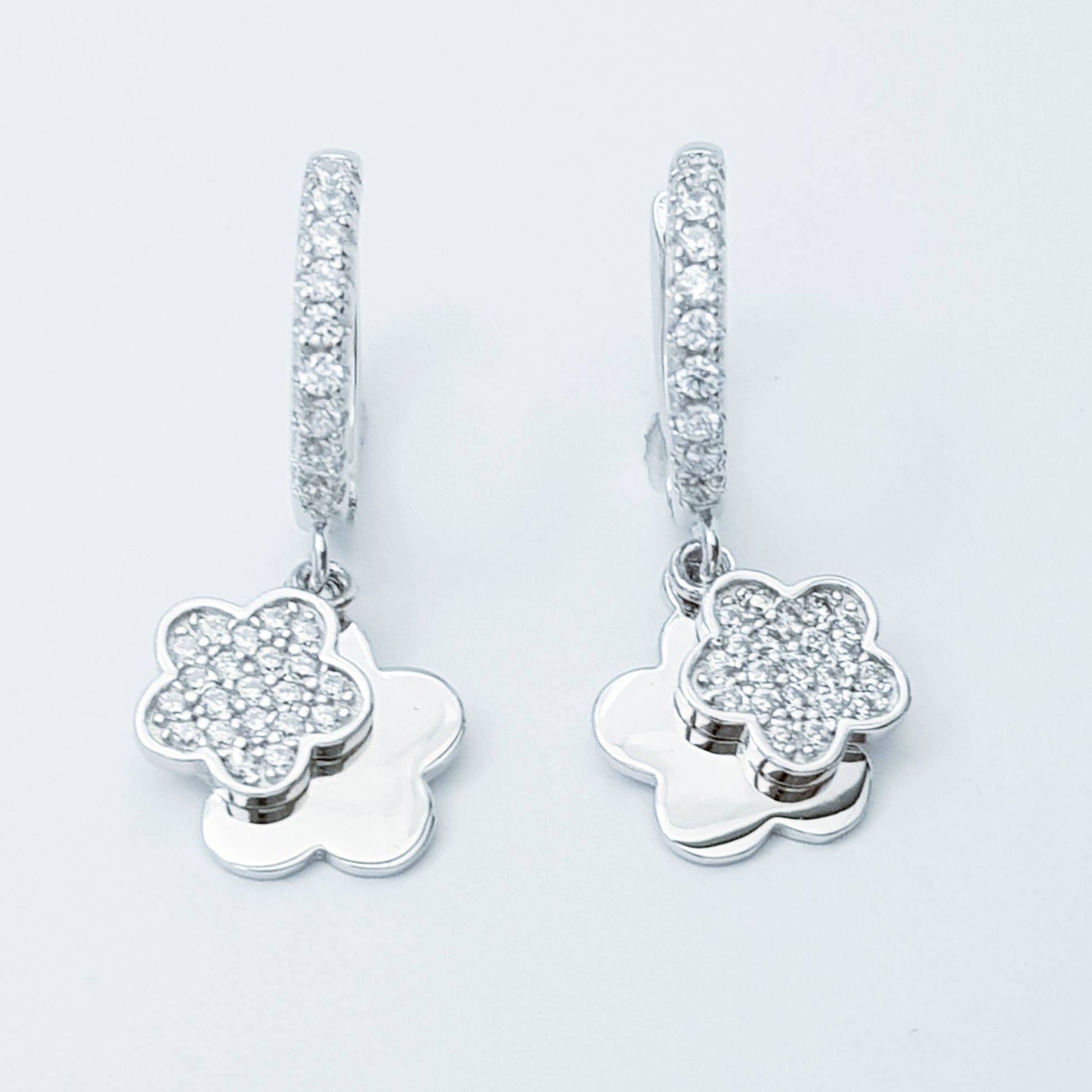 Dainty silver hoop earrings with two dangling floral charms, cute flower drop earrings, Minimalist Earrings, 925 Silver Dangle Hoops,