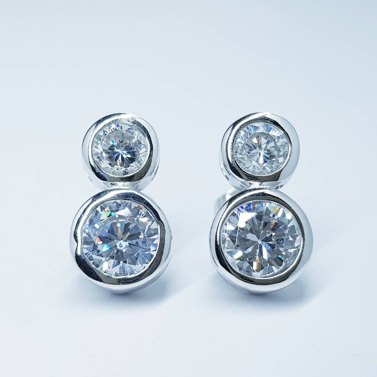 Sterling Silver stud earrings, two stone stud earrings, man made Diamond Simulant studs,
