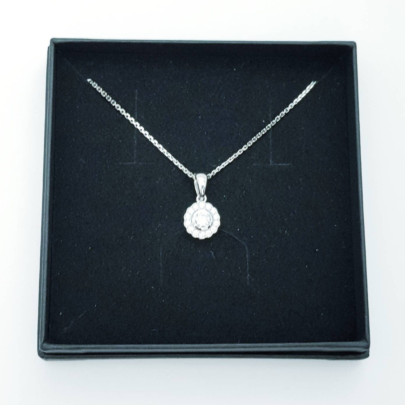 Dainty sterling silver vinatge halo necklace with antique style millgrain edge