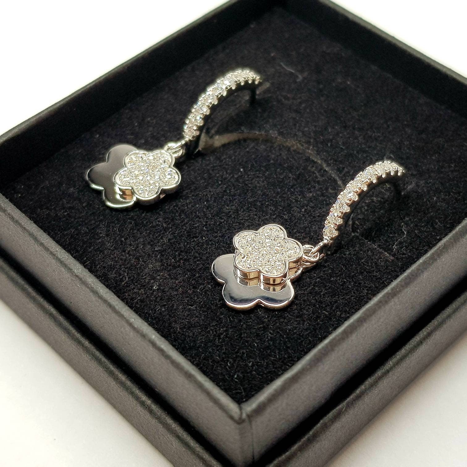 Dainty silver hoop earrings with two dangling floral charms, cute flower drop earrings, Minimalist Earrings, 925 Silver Dangle Hoops,