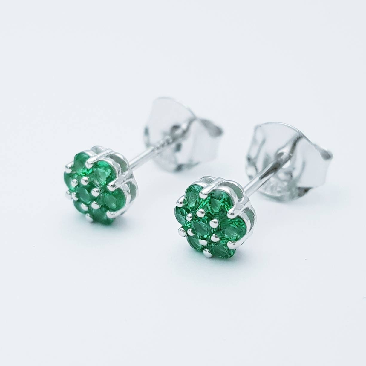Minimal sterling silver claw set green stud earrings, second hole earring, small floral stud