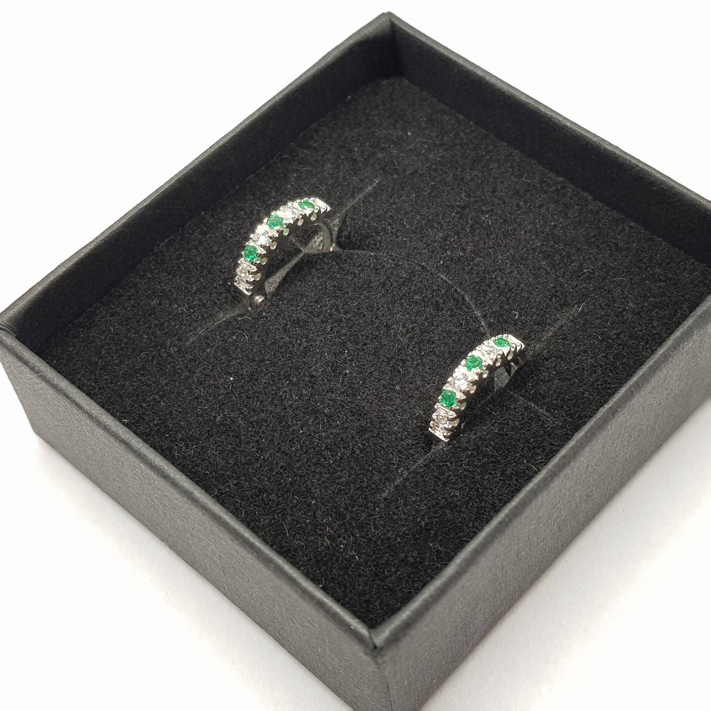 Small silver hoops with green and white CZs, mini hoop earrings, second hole huggies