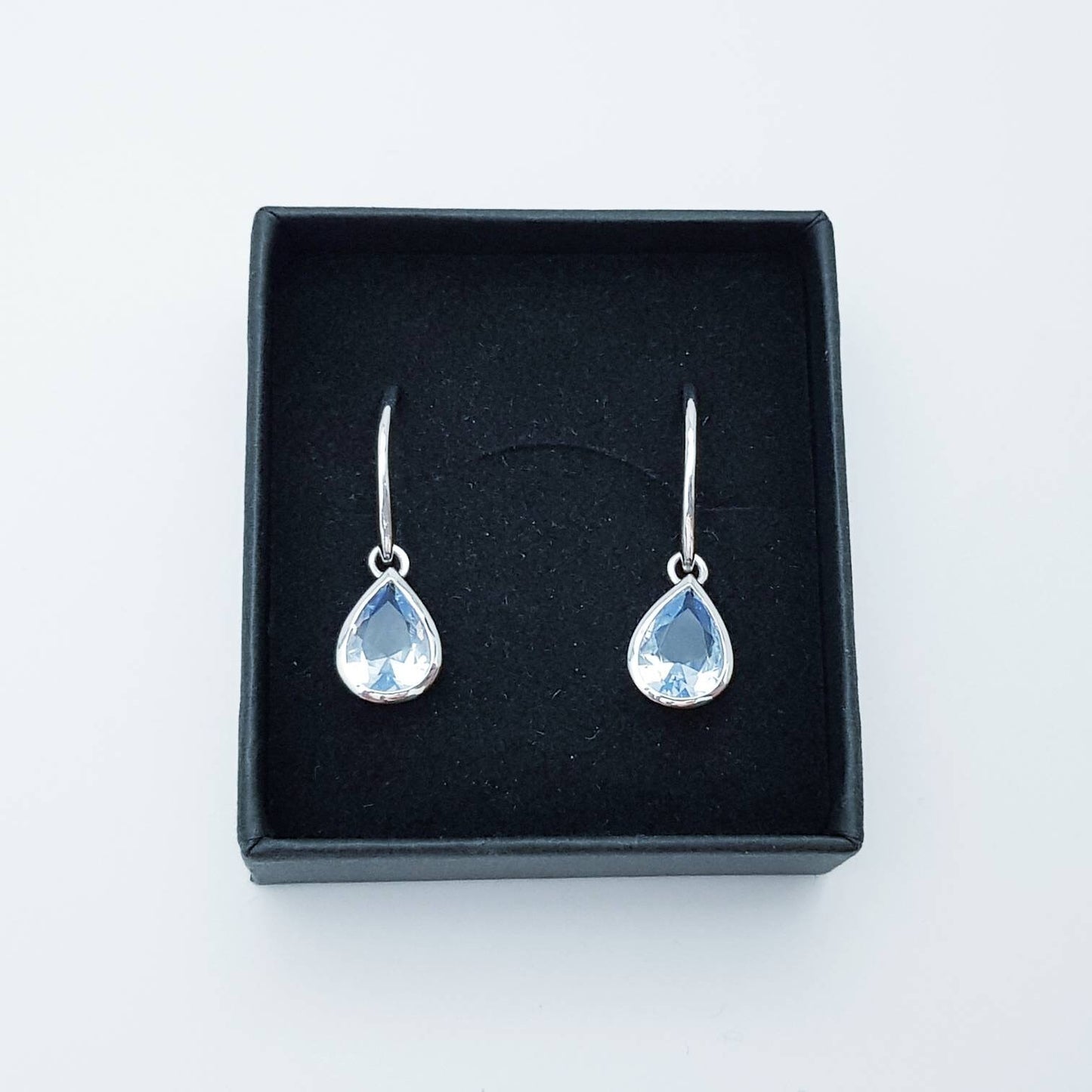 Light blue aquamarine teardrop earrings with French wire fitting - dainty blue drop wire earrings