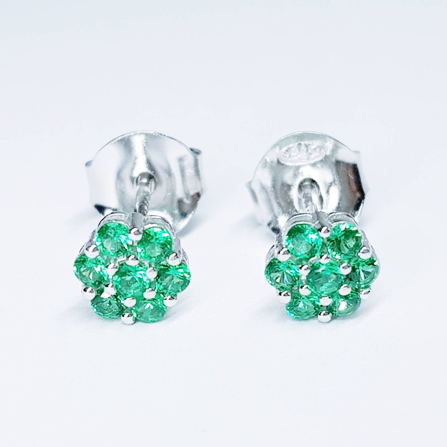 Minimal sterling silver claw set green stud earrings, second hole earring, small floral stud