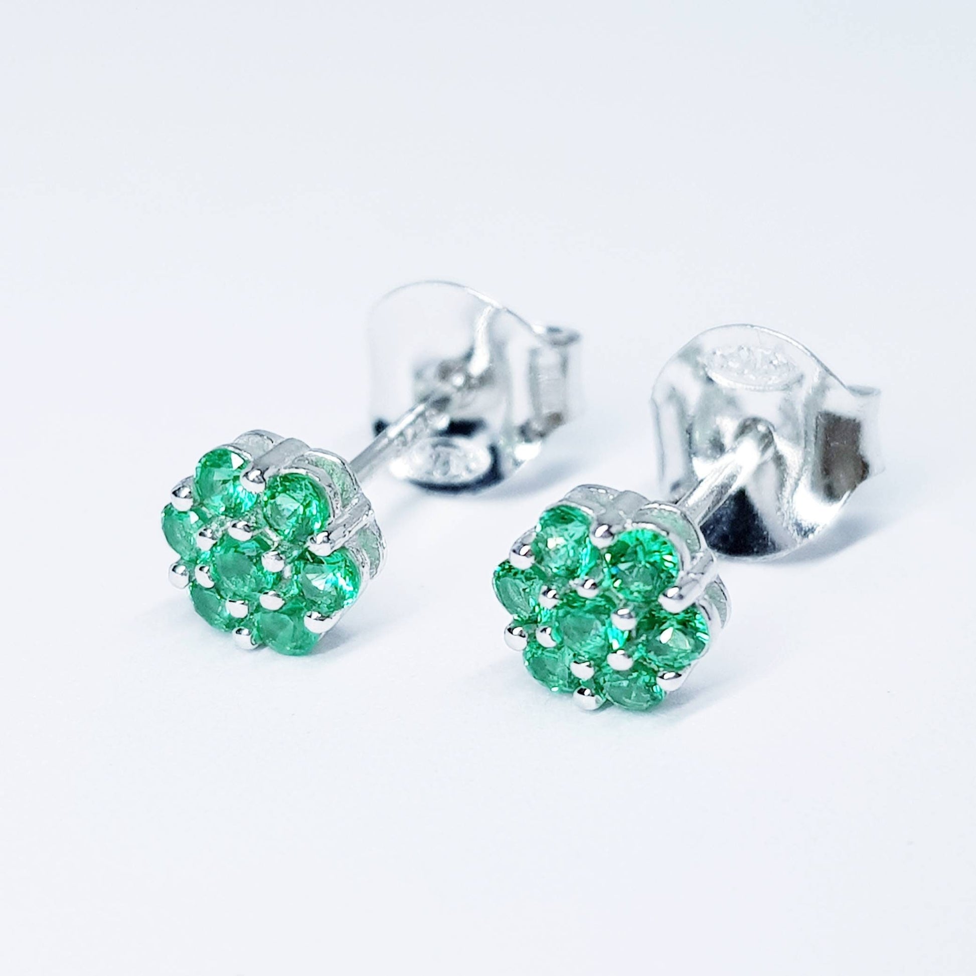 Minimal sterling silver claw set green stud earrings, second hole earring, small floral stud