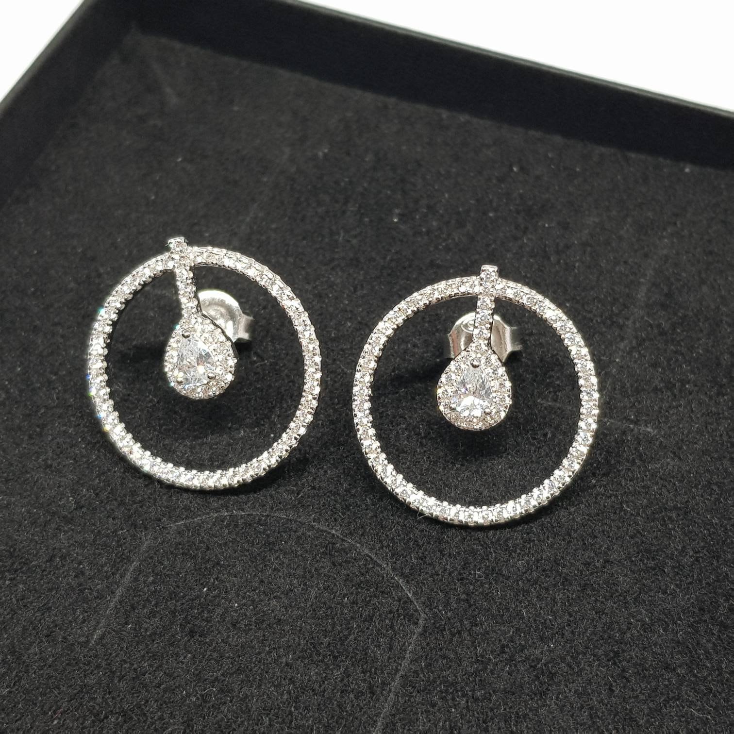 Teardrop stud earrings, modern  Earrings, silver circle stud earring