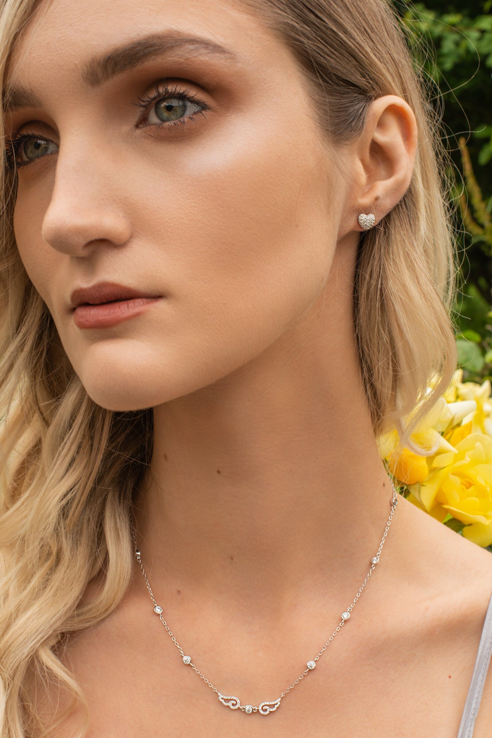 Dainty Sterling silver heart shaped stud earrings, cute faux diamond heart earrings