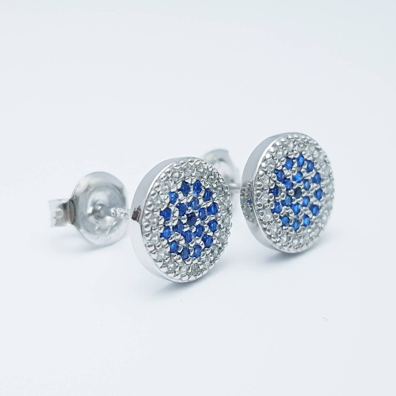 Flat round sterling silver blue stud earrings, pavé set blue earrings