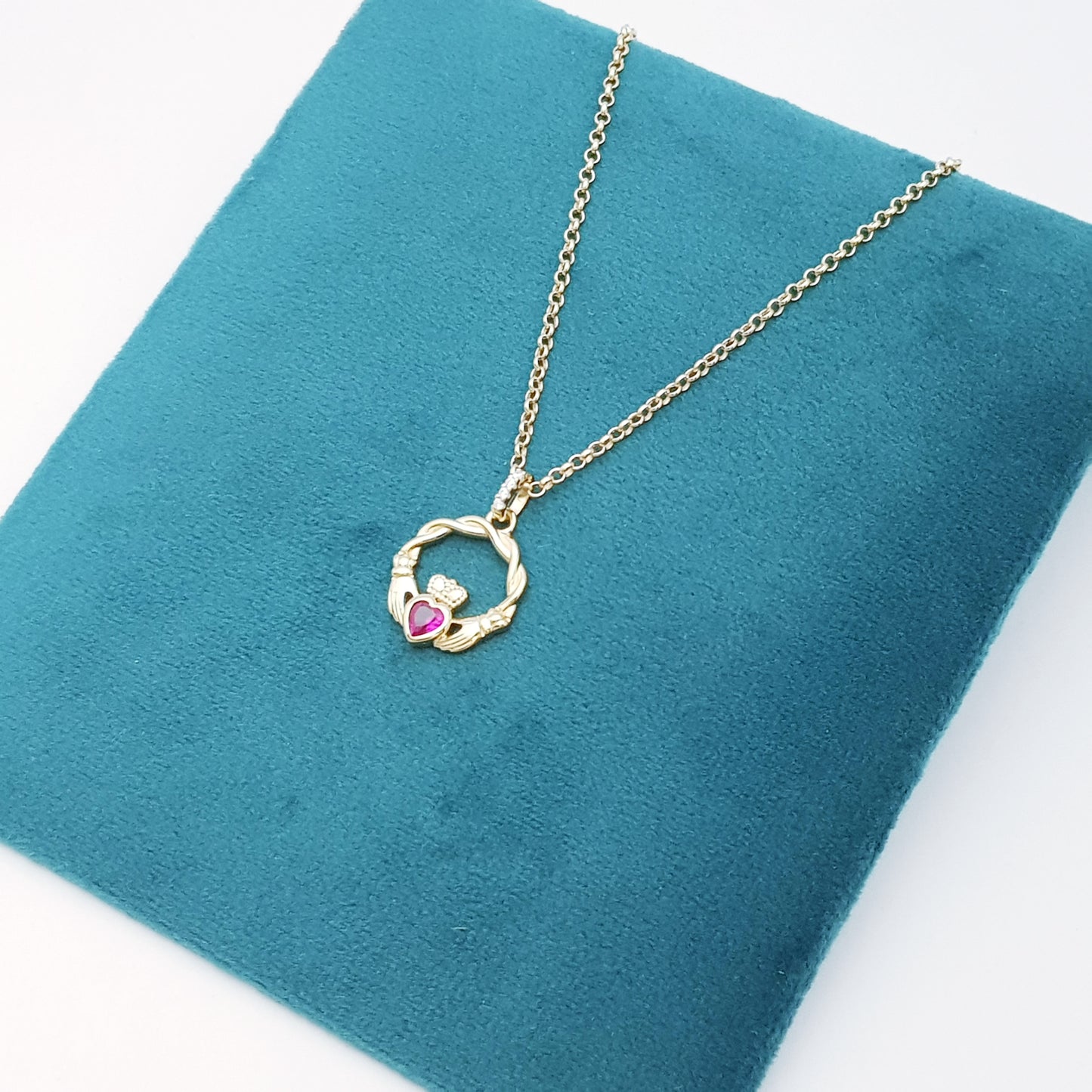 Dainty Sterling Silver claddagh necklace set with red Ruby birthstone