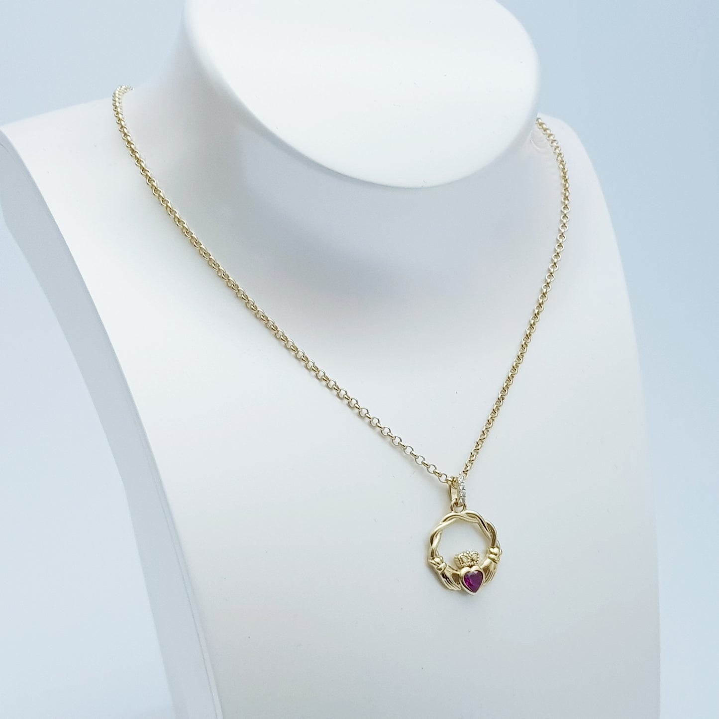 Dainty Sterling Silver claddagh necklace set with red Ruby birthstone