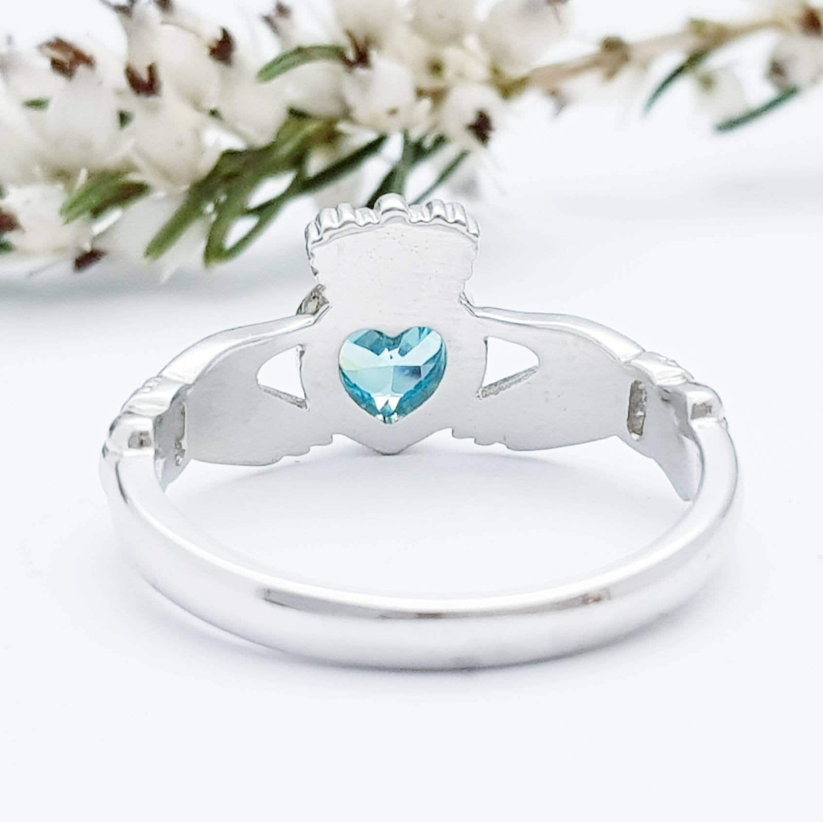 Sterling Silver Claddagh ring set with electric blue heart shaped stone, Irish claddagh rings