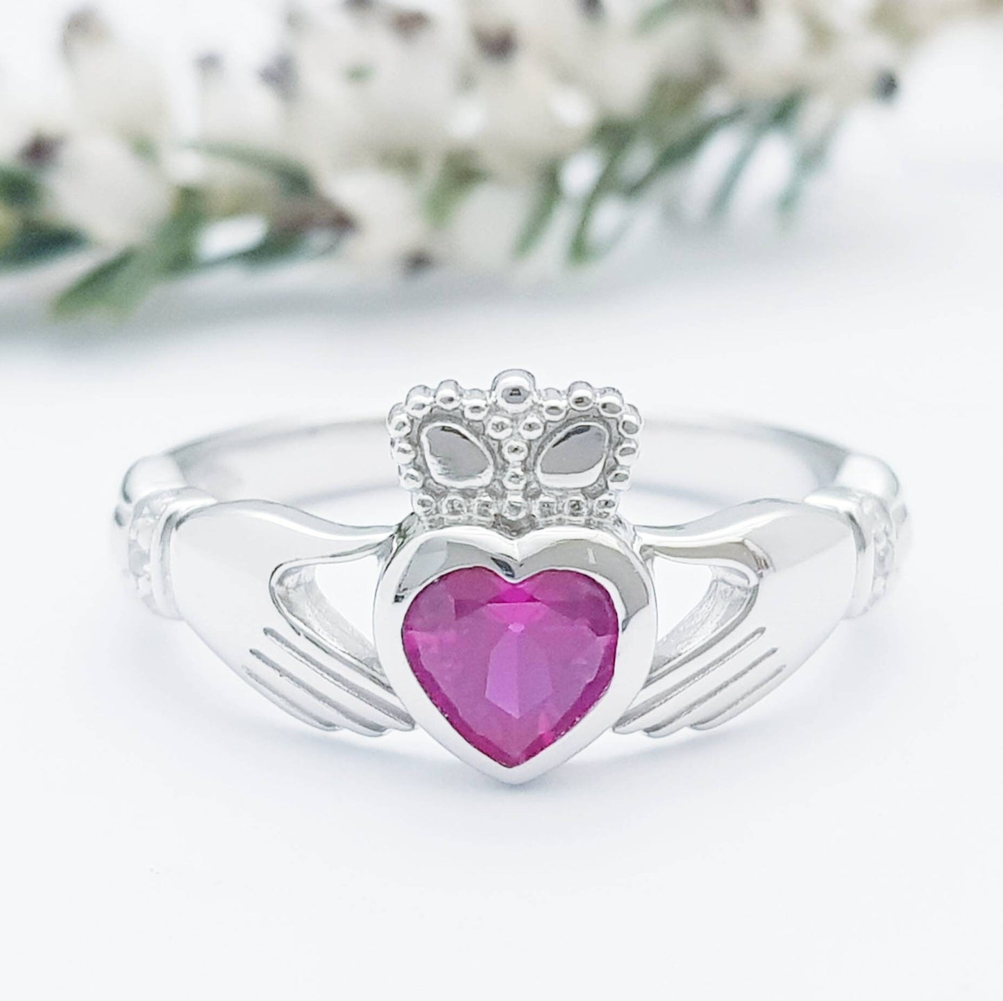 Sterling Silver Claddagh ring set with ruby red heart shaped stone, July birthstone claddagh ring