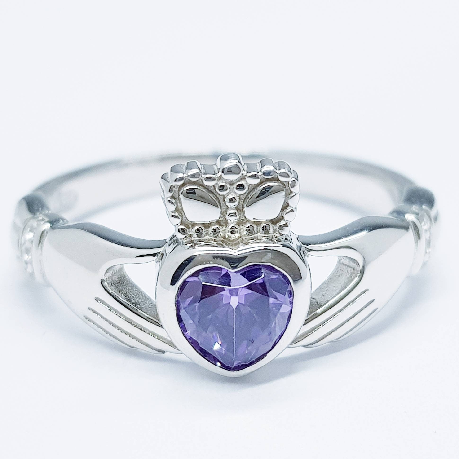 Sterling Silver Claddagh ring set with purple heart shaped stone, february birthstone claddagh