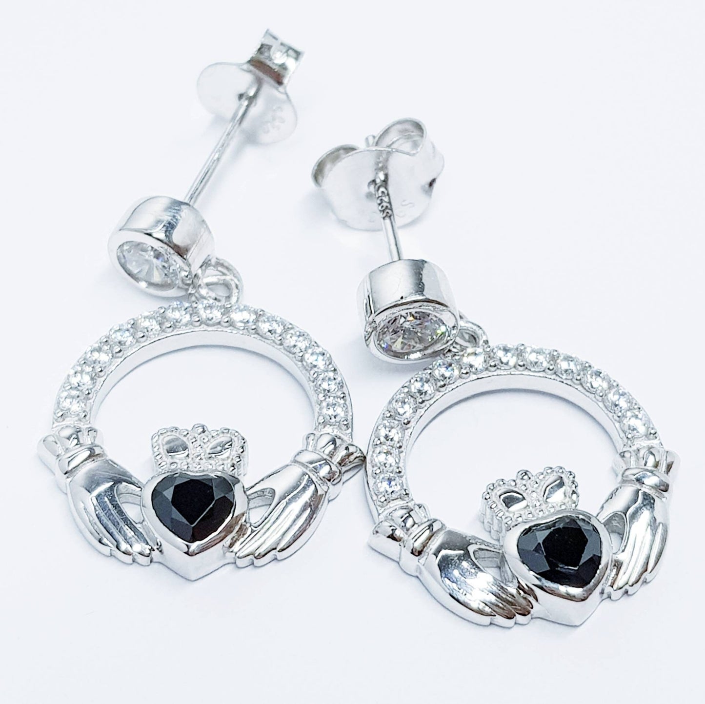 Silver claddagh drop earrings with black stone heart