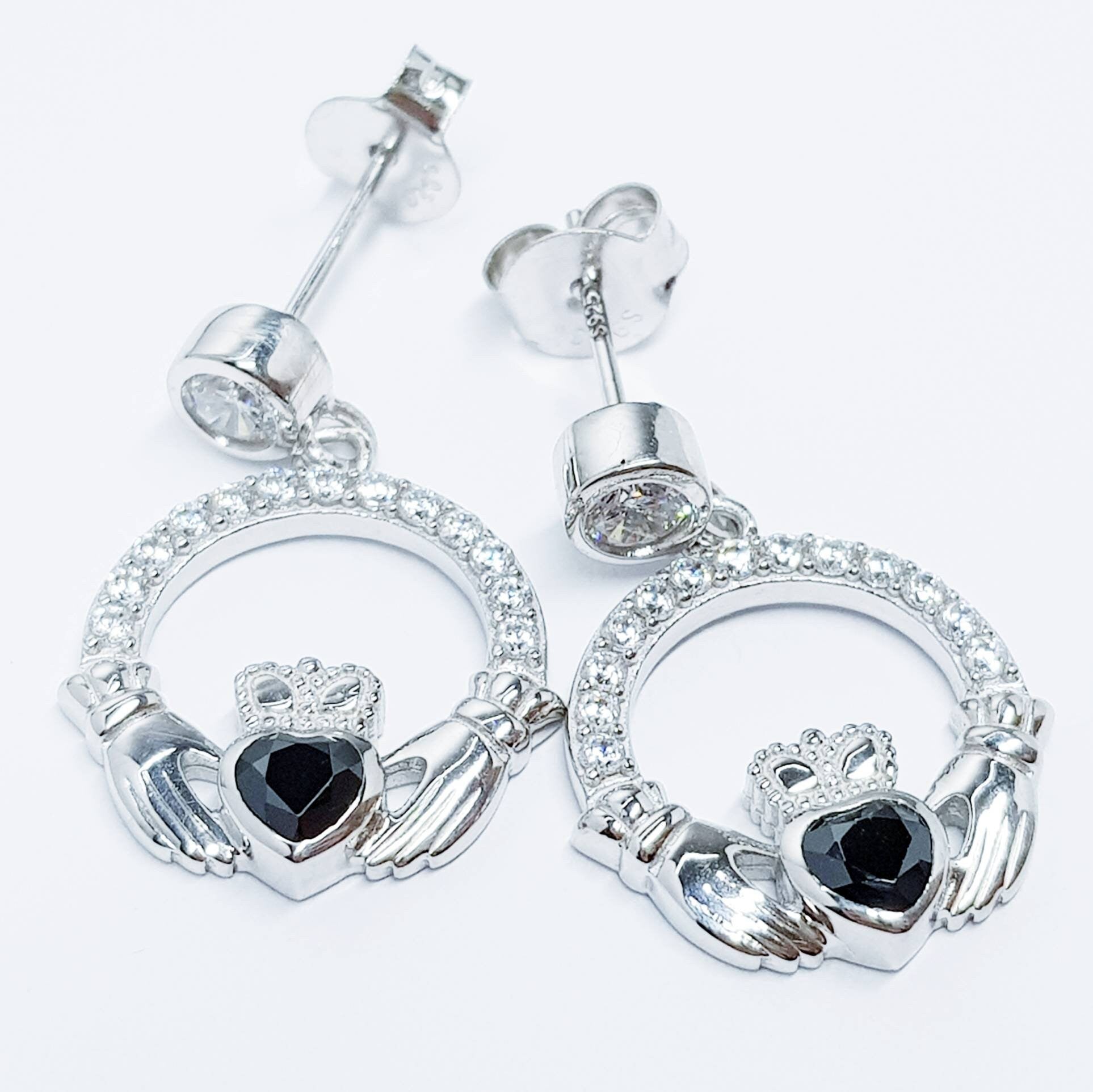 Silver claddagh drop earrings with black stone heart