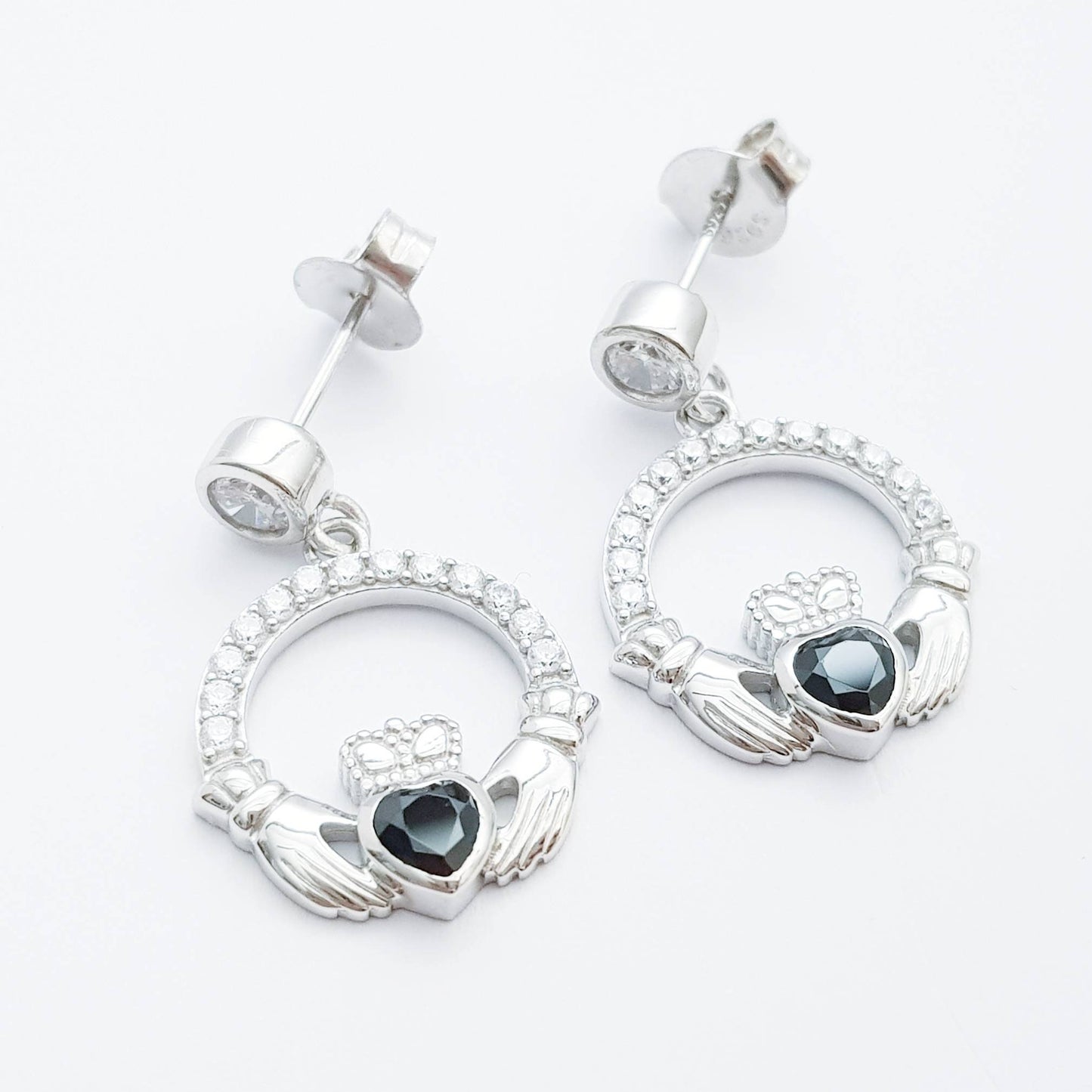 Silver claddagh drop earrings with black stone heart