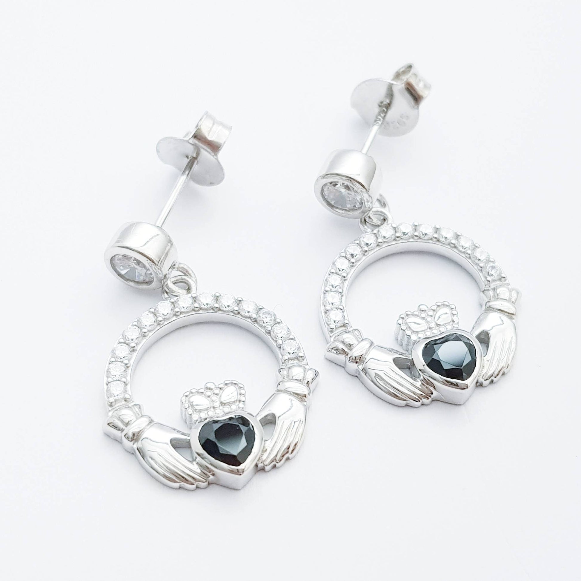 Silver claddagh drop earrings with black stone heart