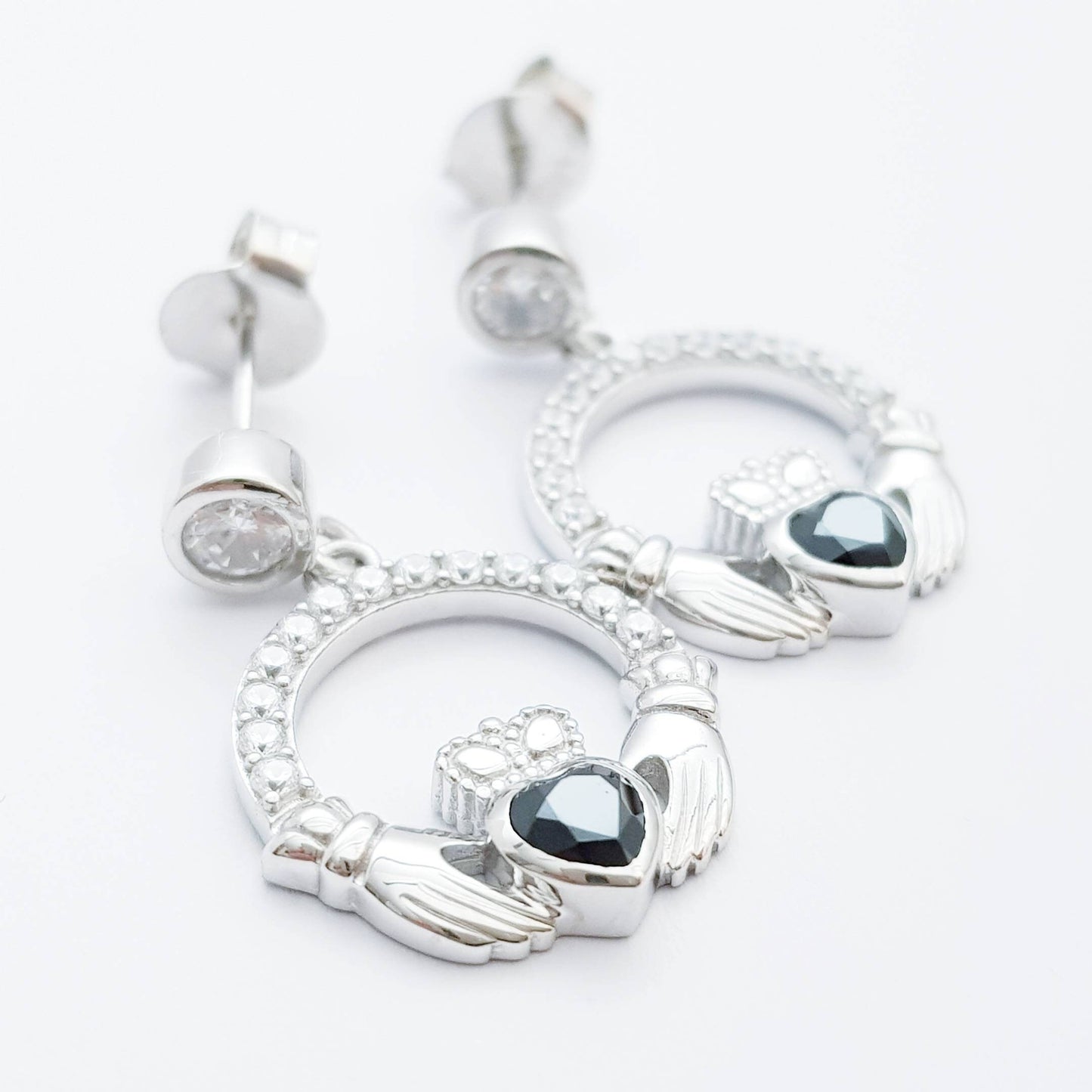 Silver claddagh drop earrings with black stone heart