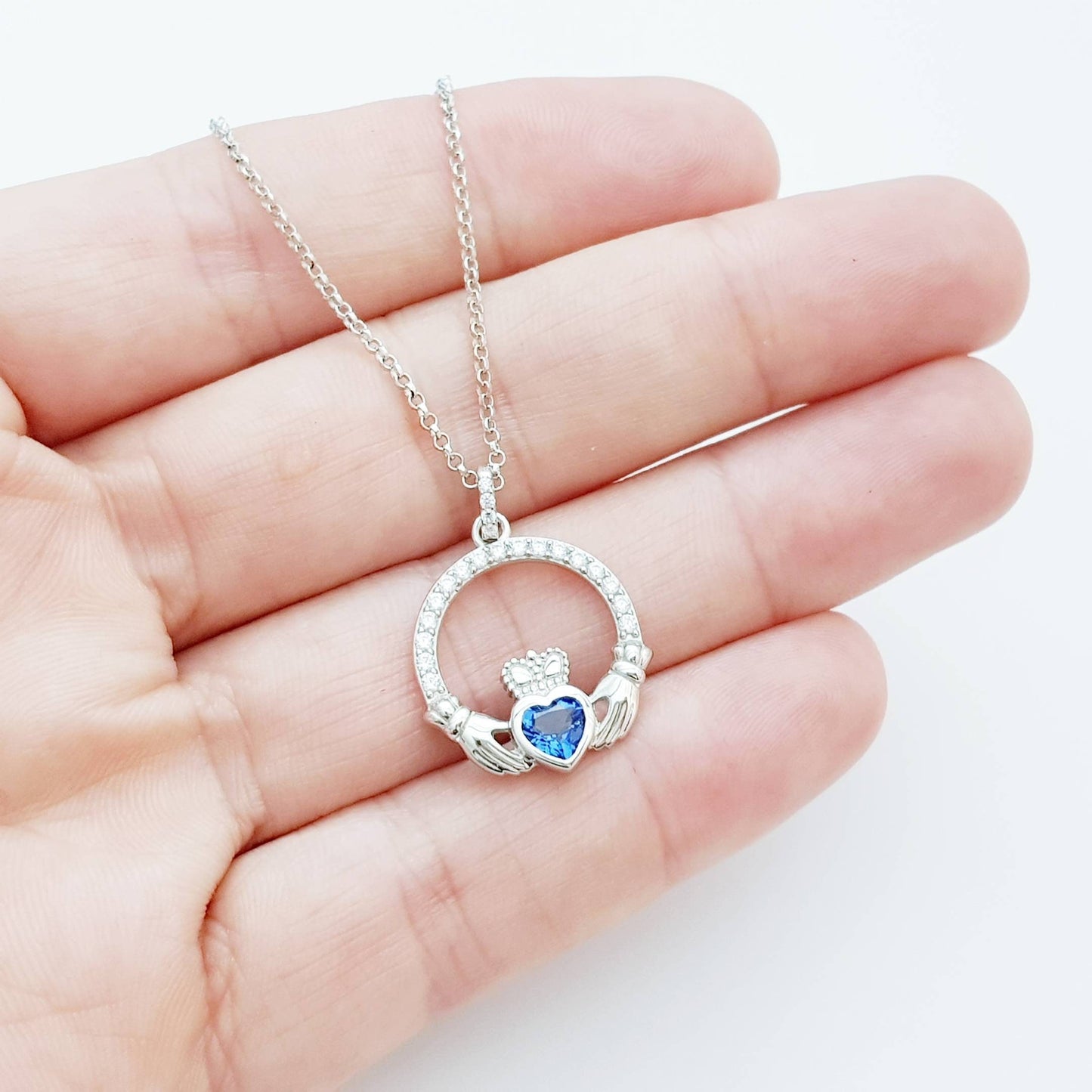 Sterling Silver Claddagh pendant, sapphire blue Claddagh necklace from Ireland